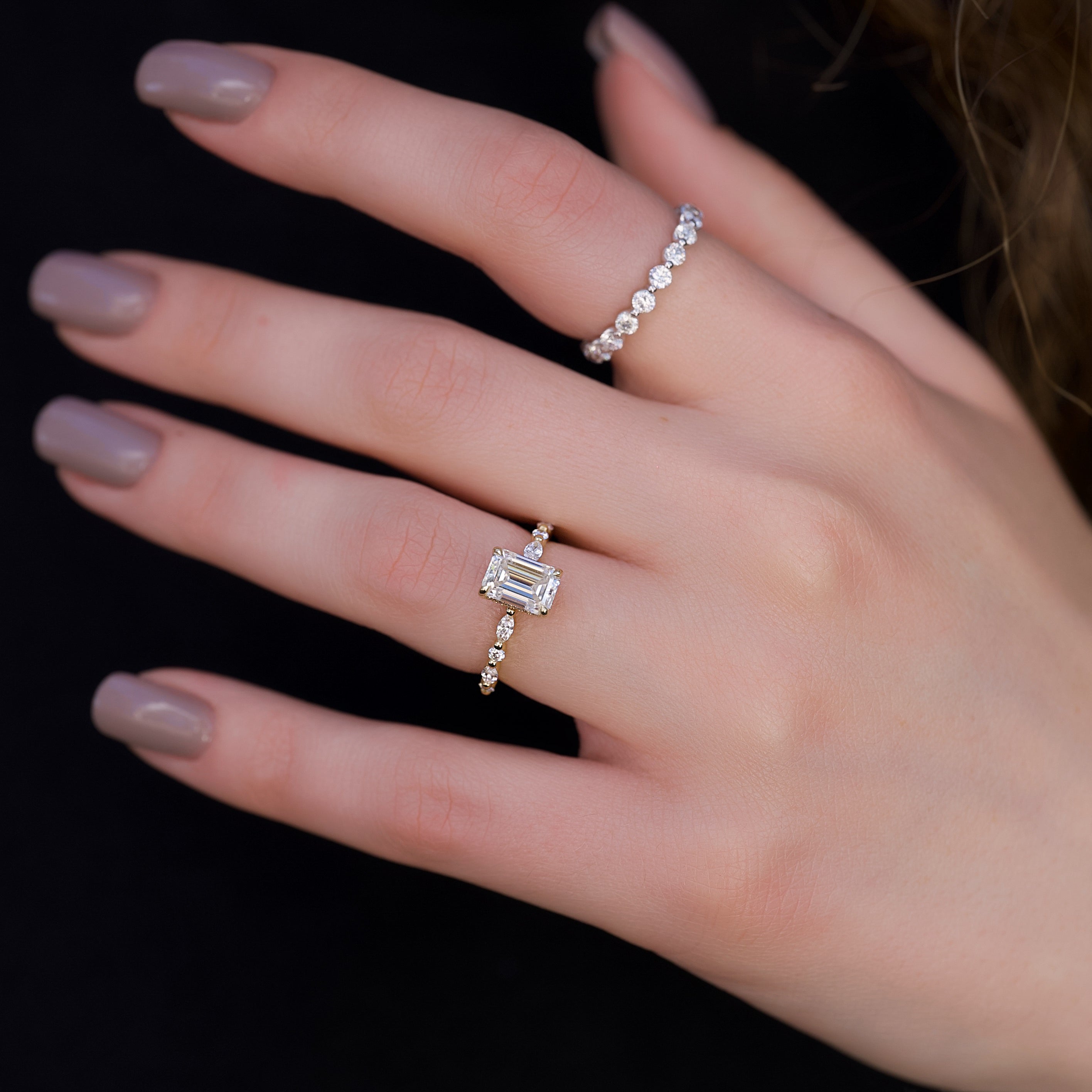 Emerald cut CVD diamond hidden halo engagement ring in white gold setting