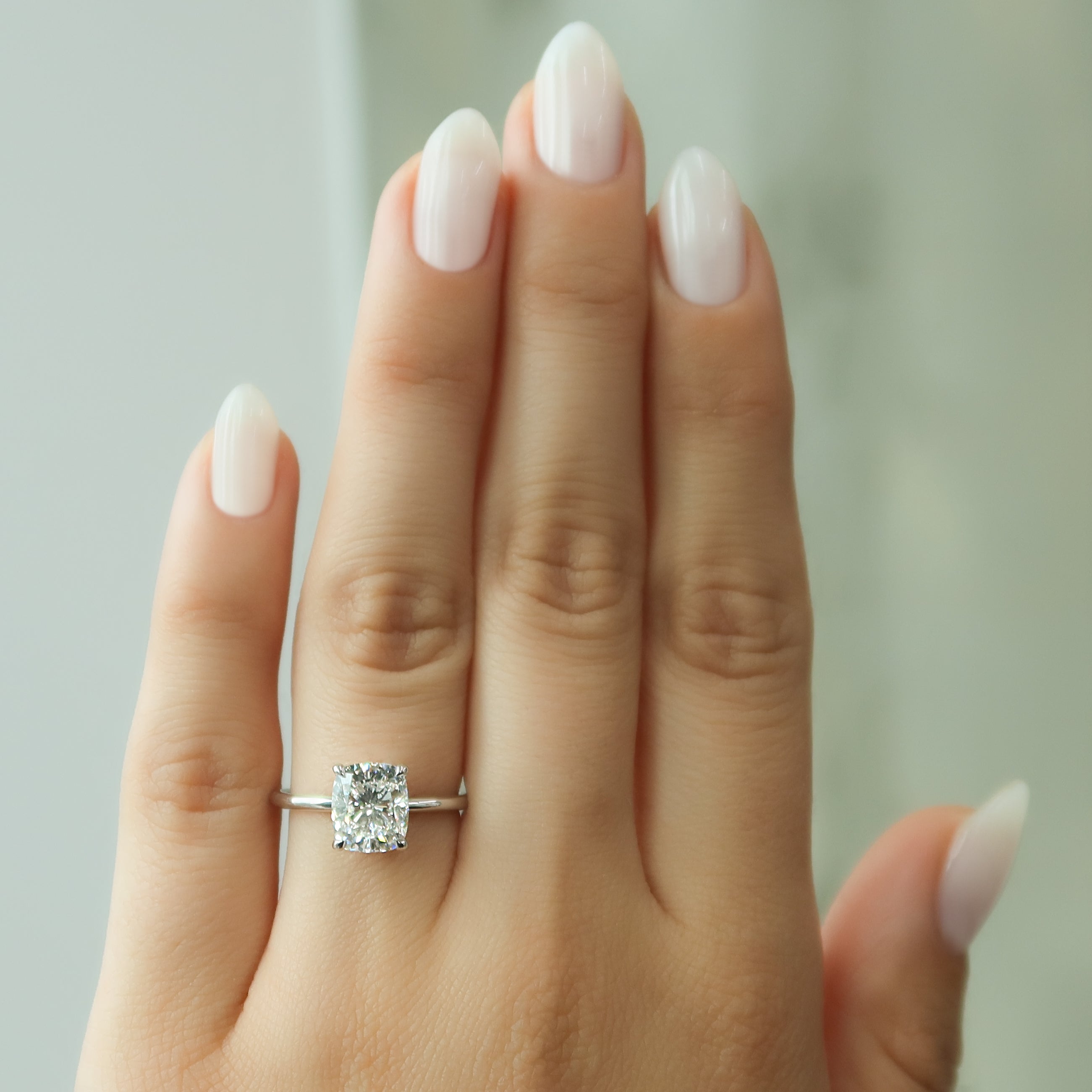 Elongated cushion cut CVD diamond solitaire engagement ring in white gold setting