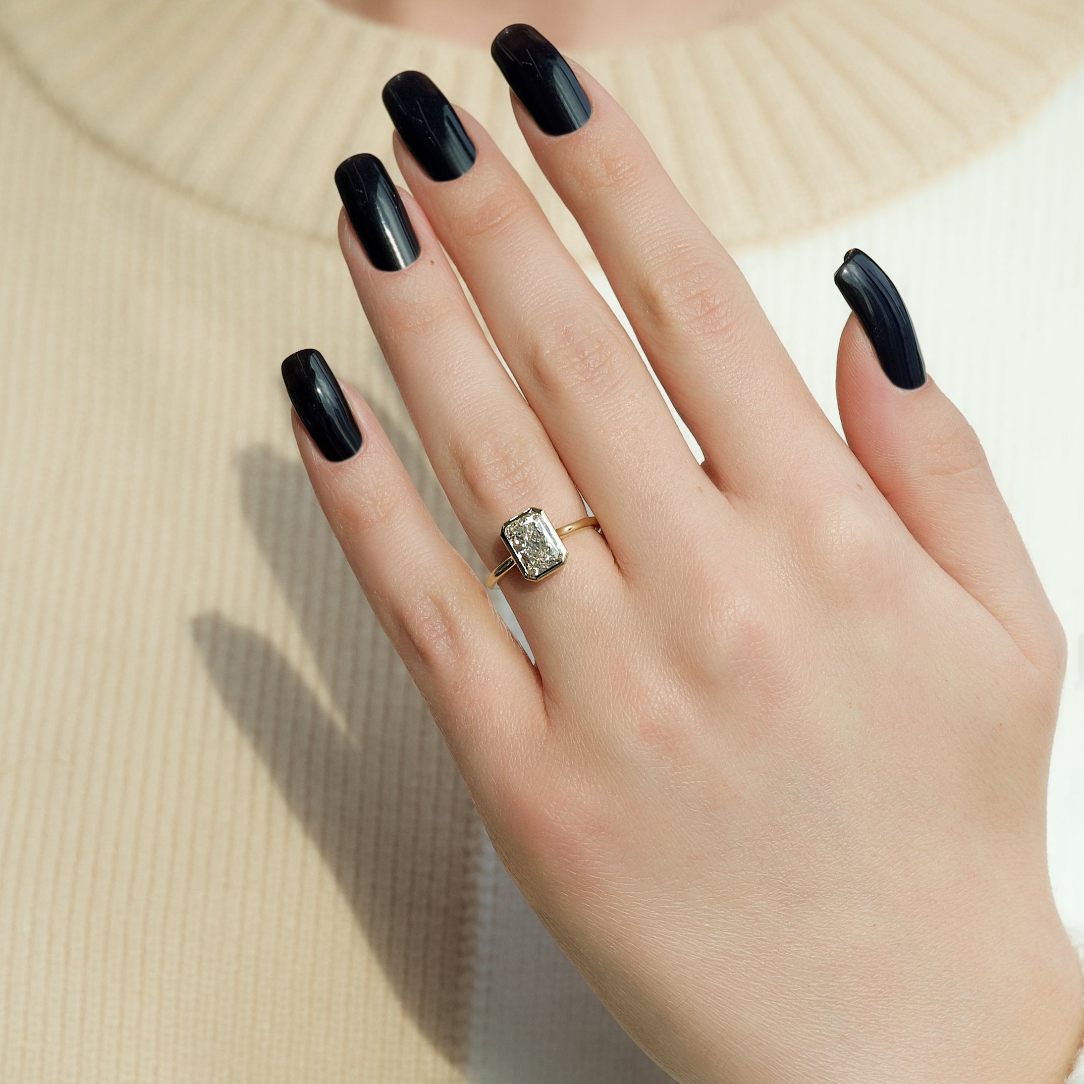 Radiant cut CVD diamond bezel set engagement ring with hidden halo in platinum setting