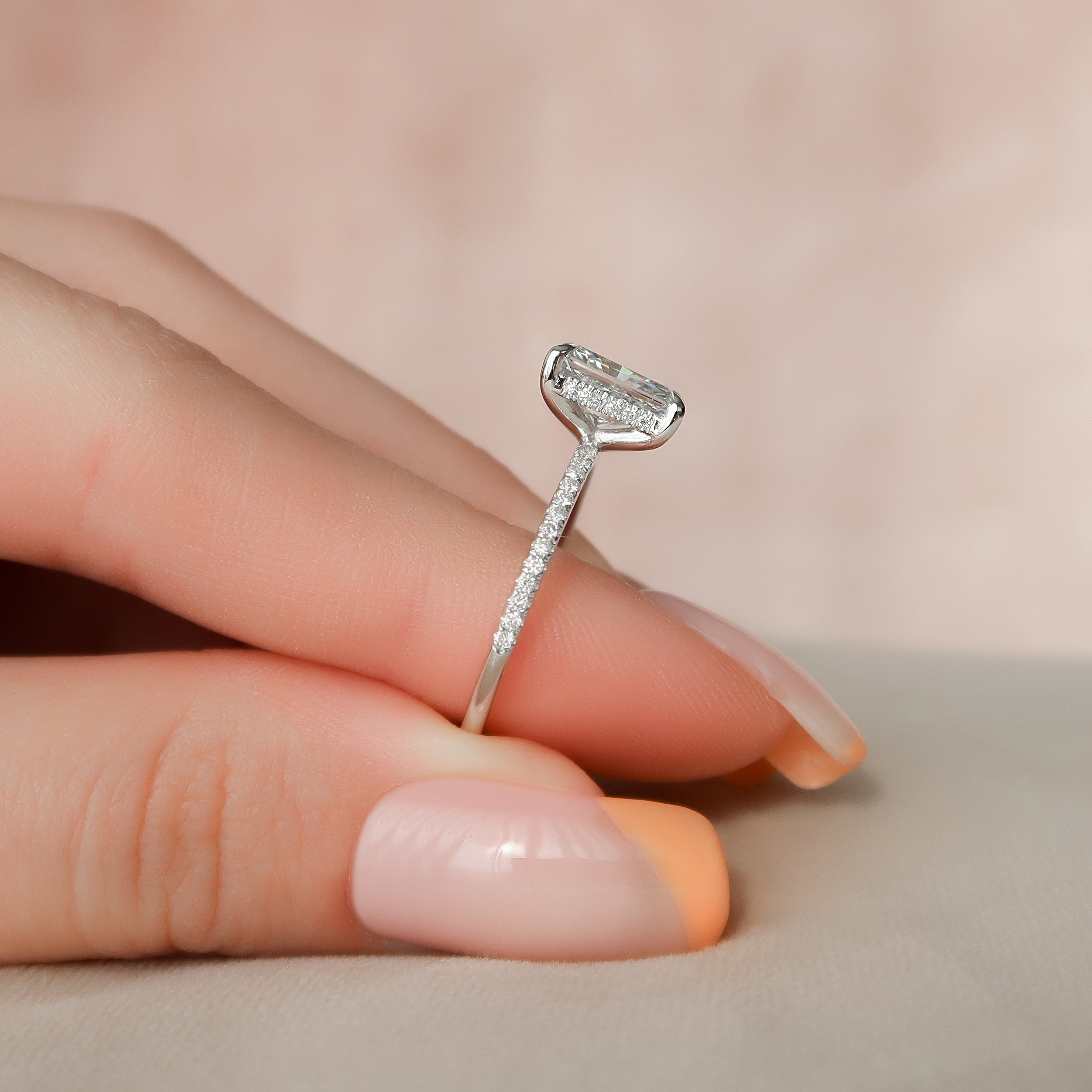 Radiant cut CVD diamond engagement ring with hidden halo and pave diamond band in white gold