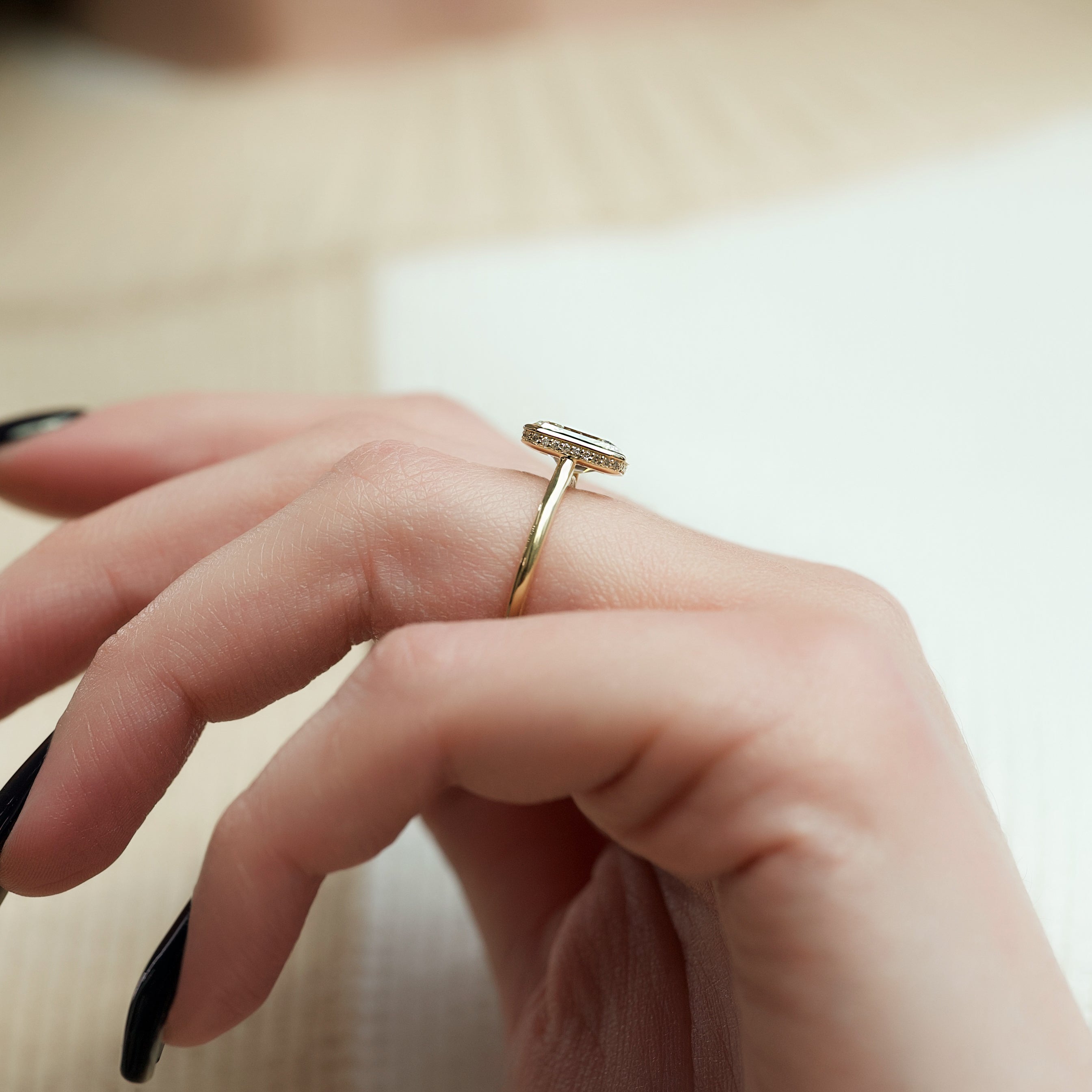 Radiant cut CVD diamond bezel set engagement ring with hidden halo in platinum setting