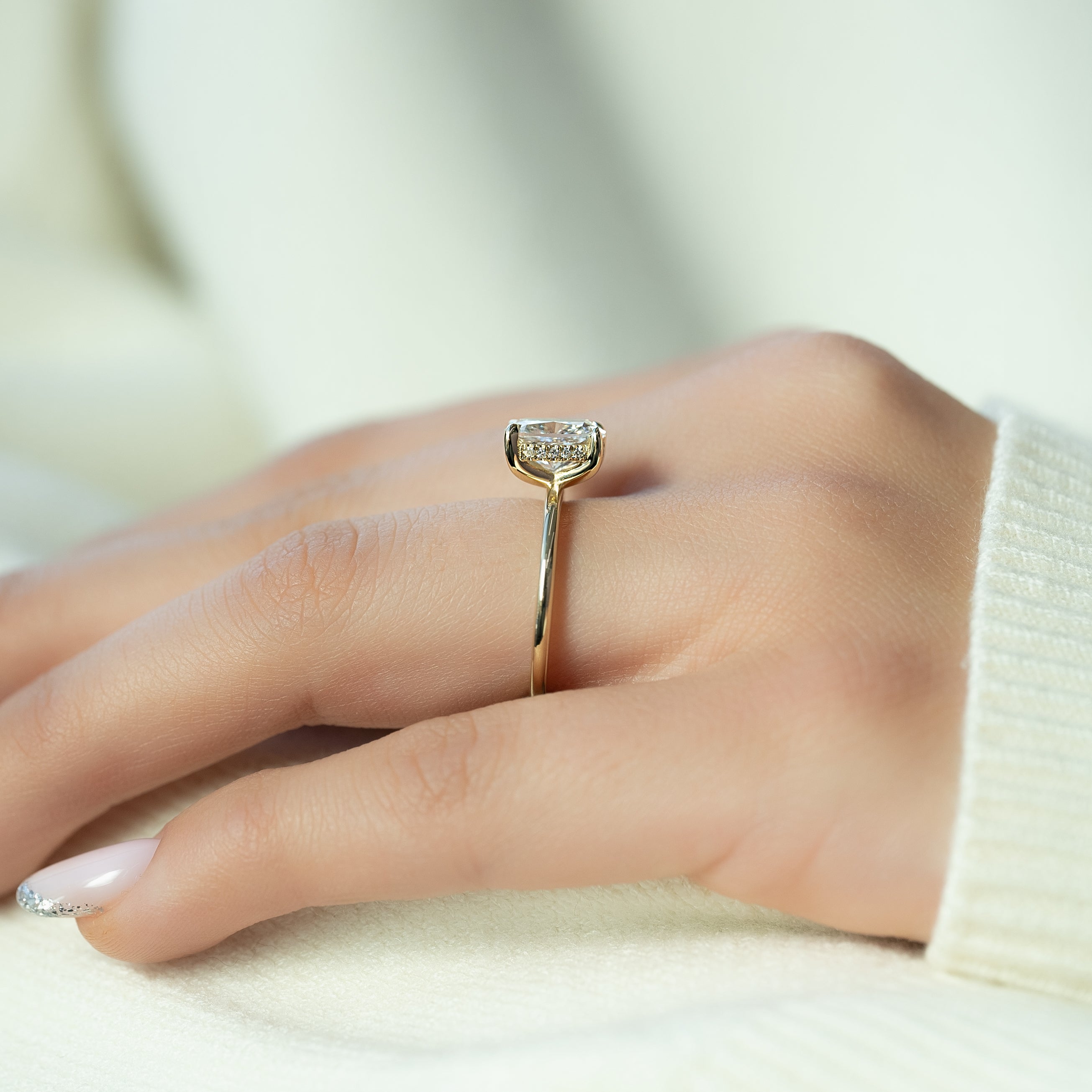 Elongated cushion cut CVD diamond engagement ring with hidden halo setting in white gold