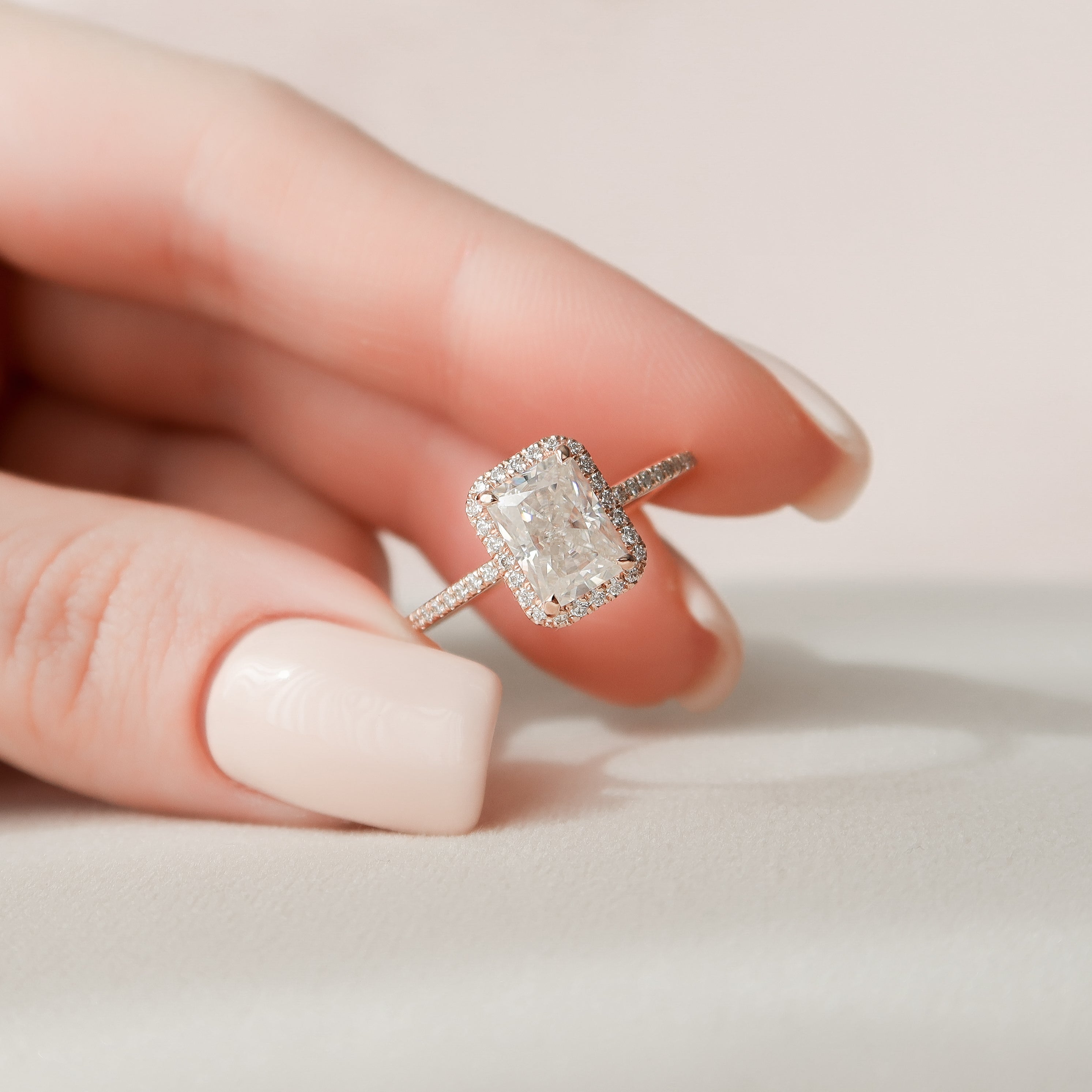 Radiant cut moissanite engagement ring with halo and pave band in platinum setting, 2.0-4.0 CT