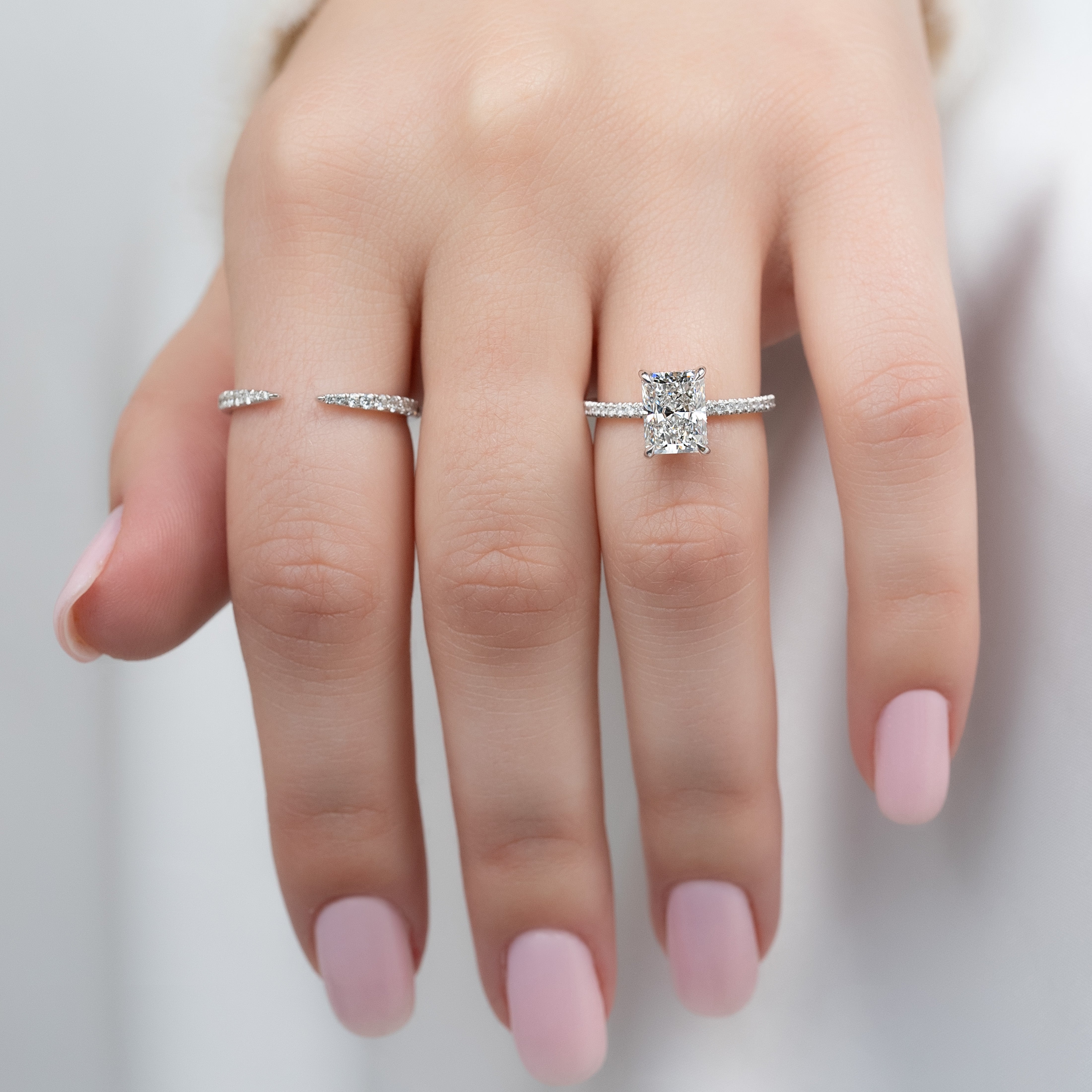 Radiant cut CVD diamond engagement ring with hidden halo and pave diamond band in white gold