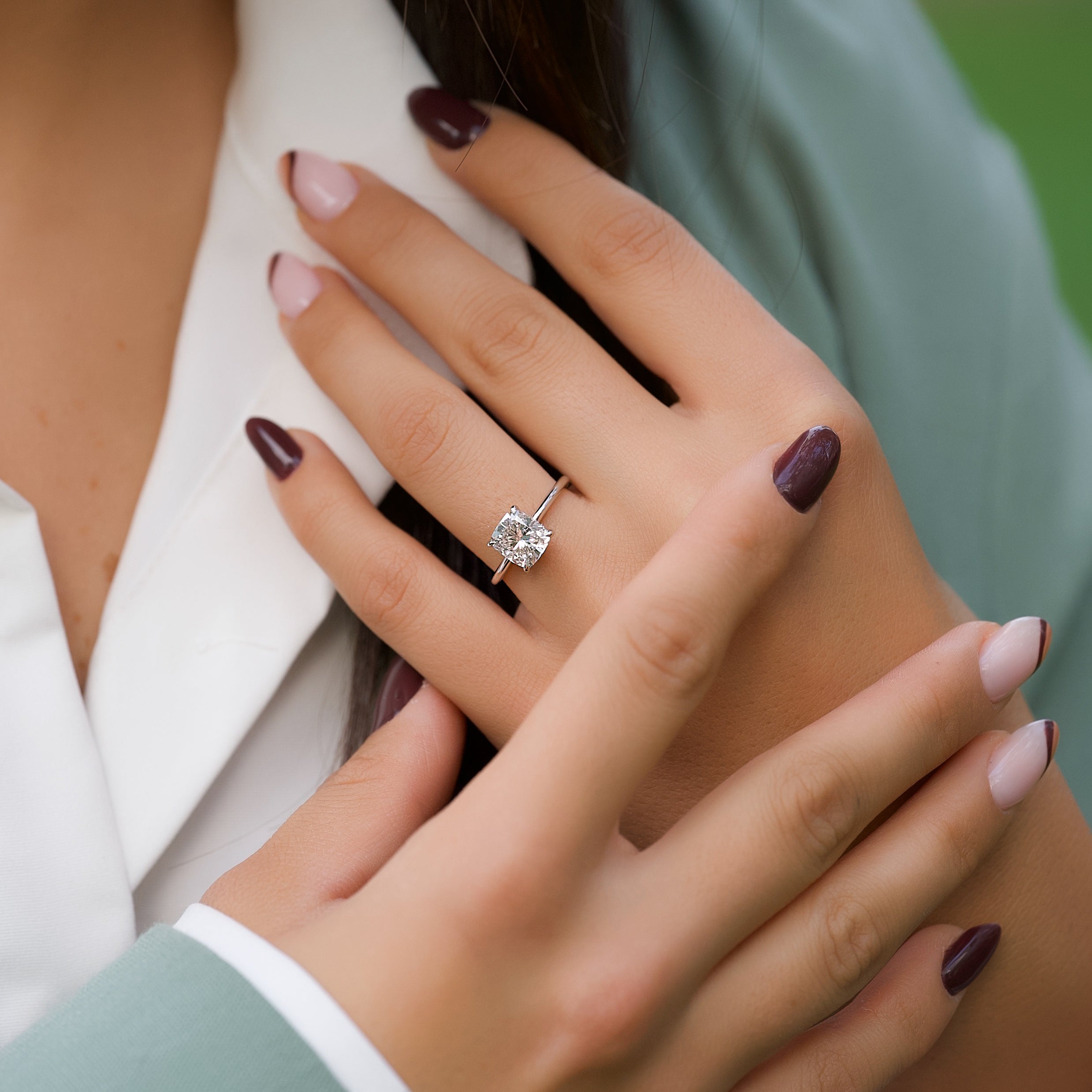 Elongated cushion cut CVD diamond engagement ring with hidden halo setting in white gold