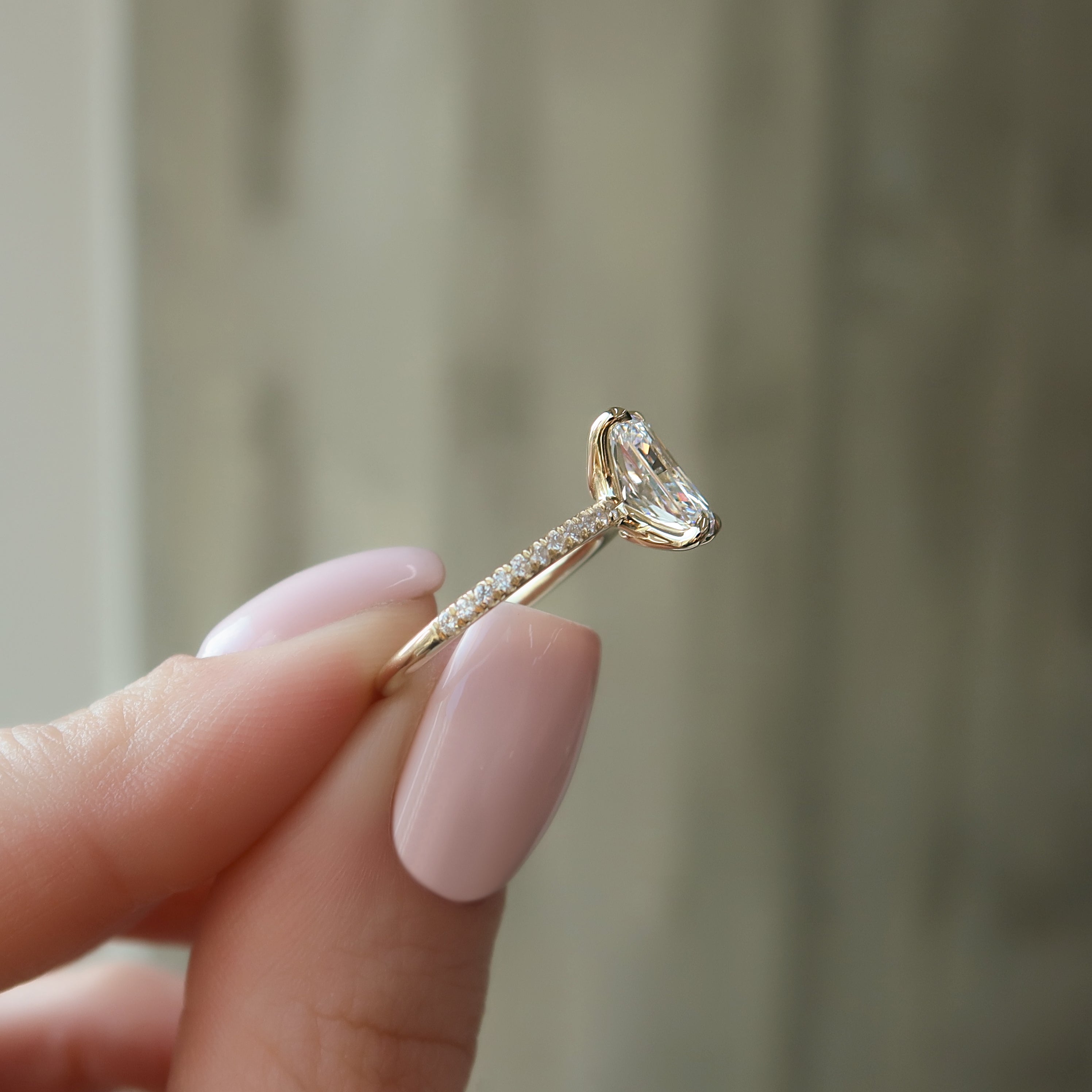 Radiant cut CVD diamond engagement ring with pave diamond band in platinum setting