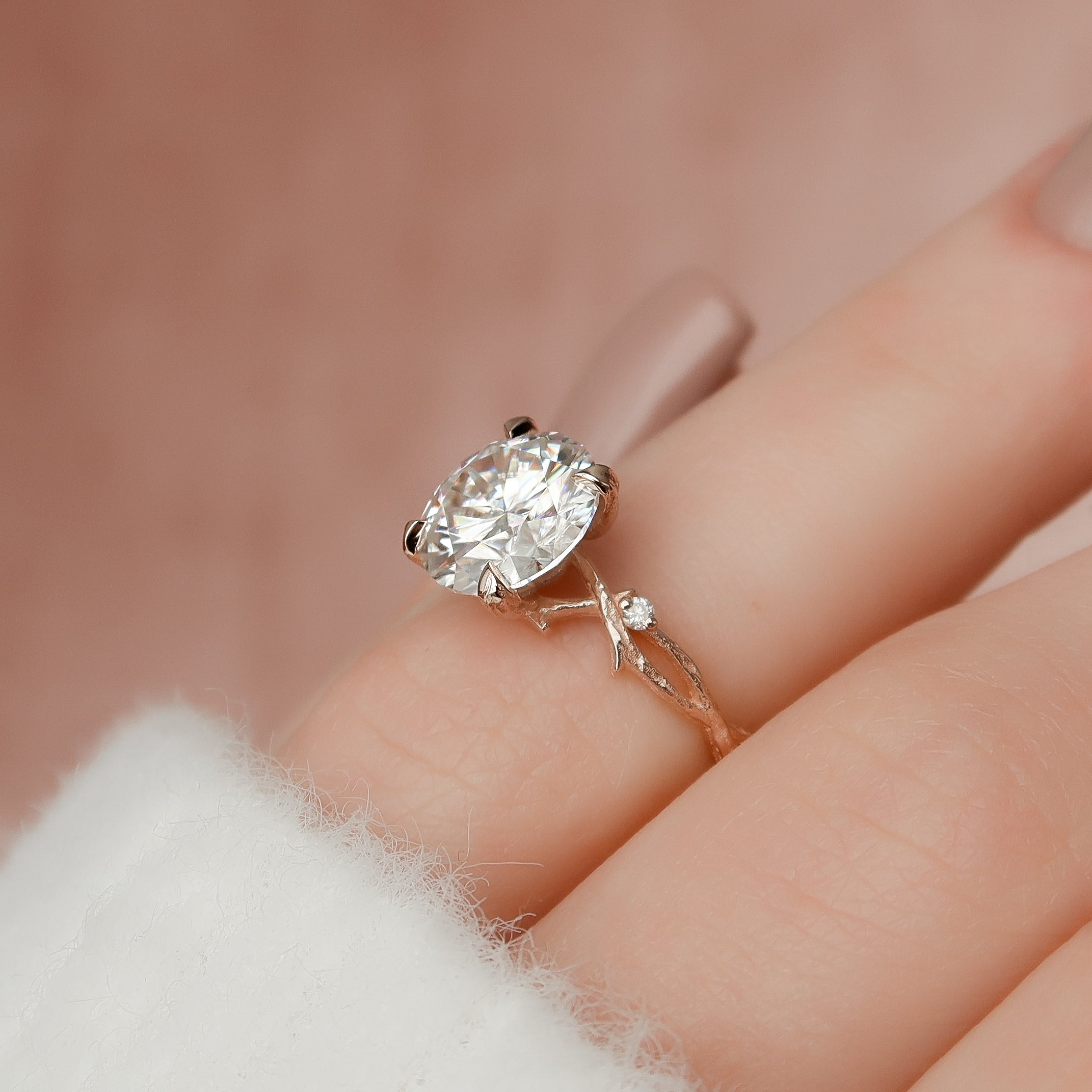 Round cut CVD diamond engagement ring with twig-inspired band in white gold