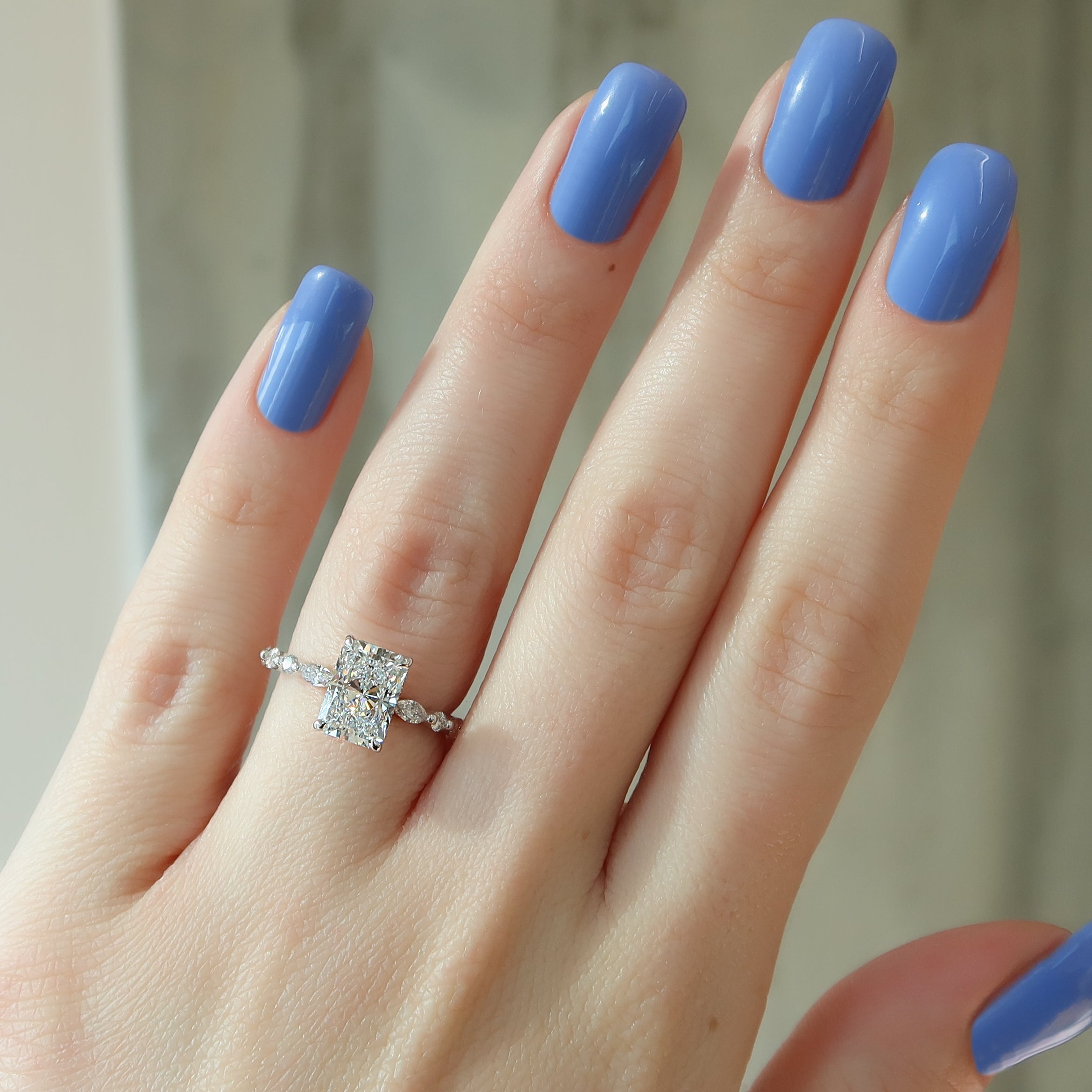 Radiant cut CVD diamond engagement ring with hidden halo and pave setting for a sparkling modern bridal style