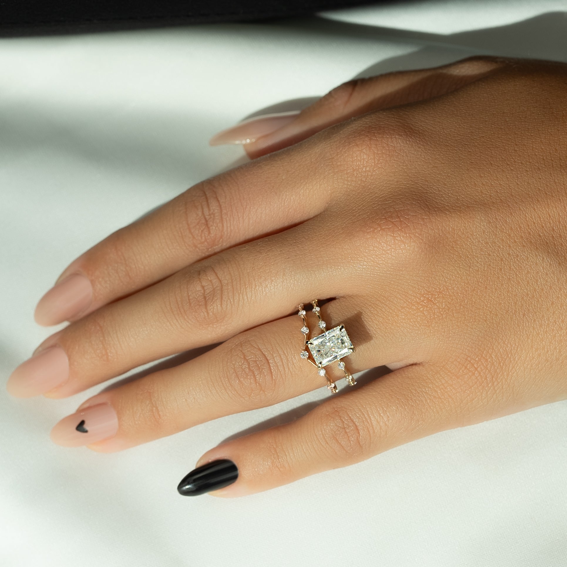 Radiant cut CVD diamond engagement ring with hidden halo in dainty platinum setting