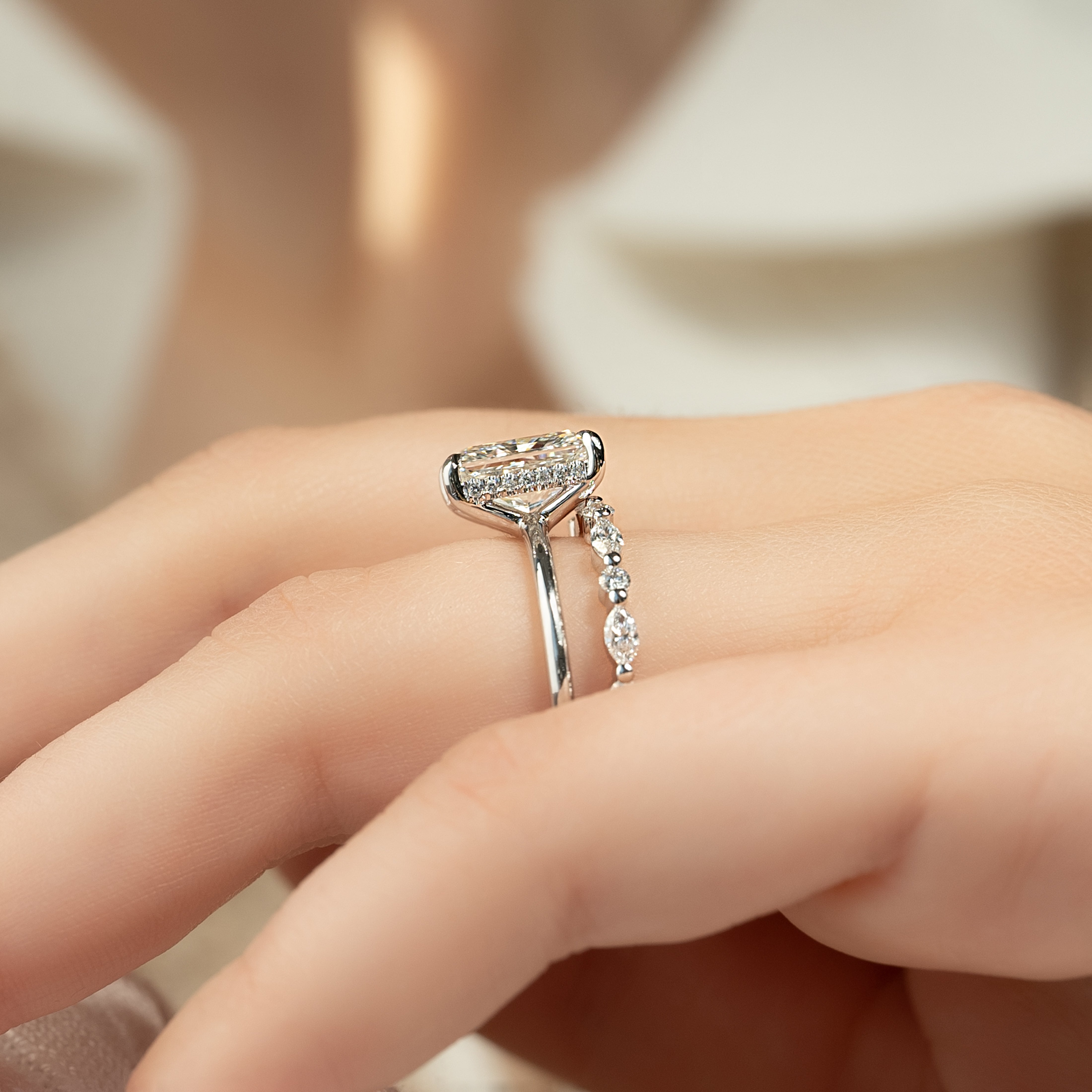 Radiant cut moissanite hidden halo engagement ring in white gold setting