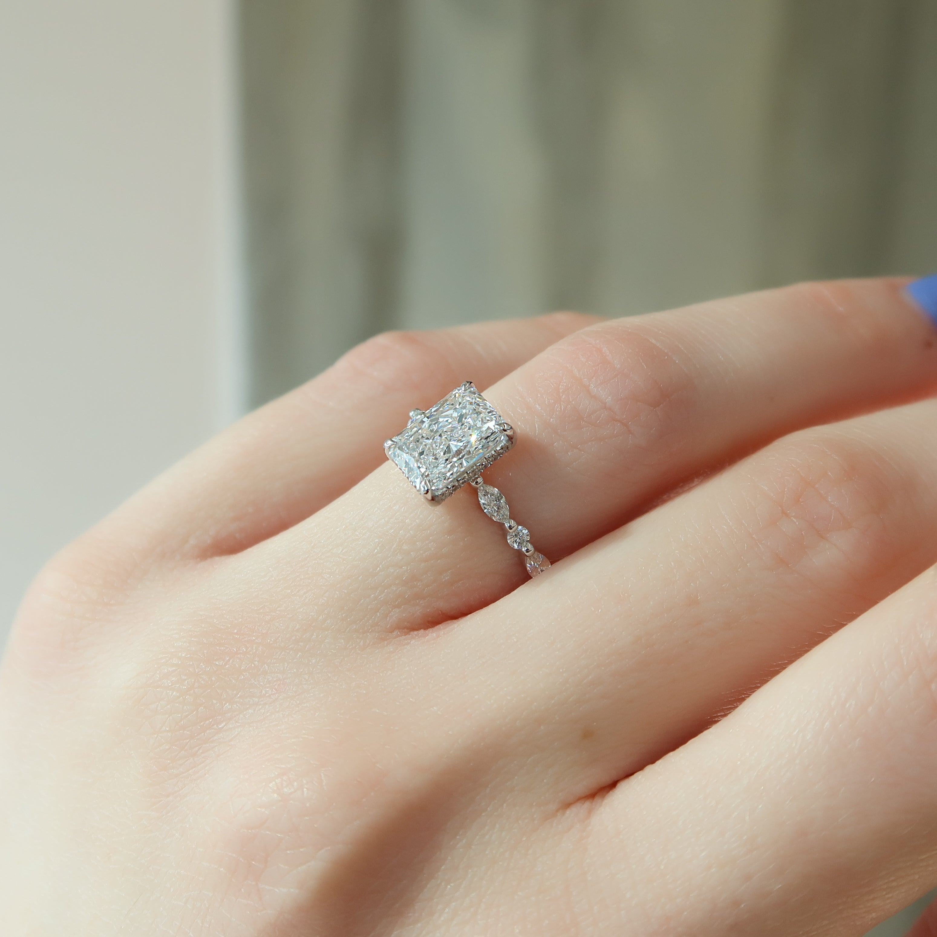 Radiant cut CVD diamond engagement ring with hidden halo and pave setting for a sparkling modern bridal style