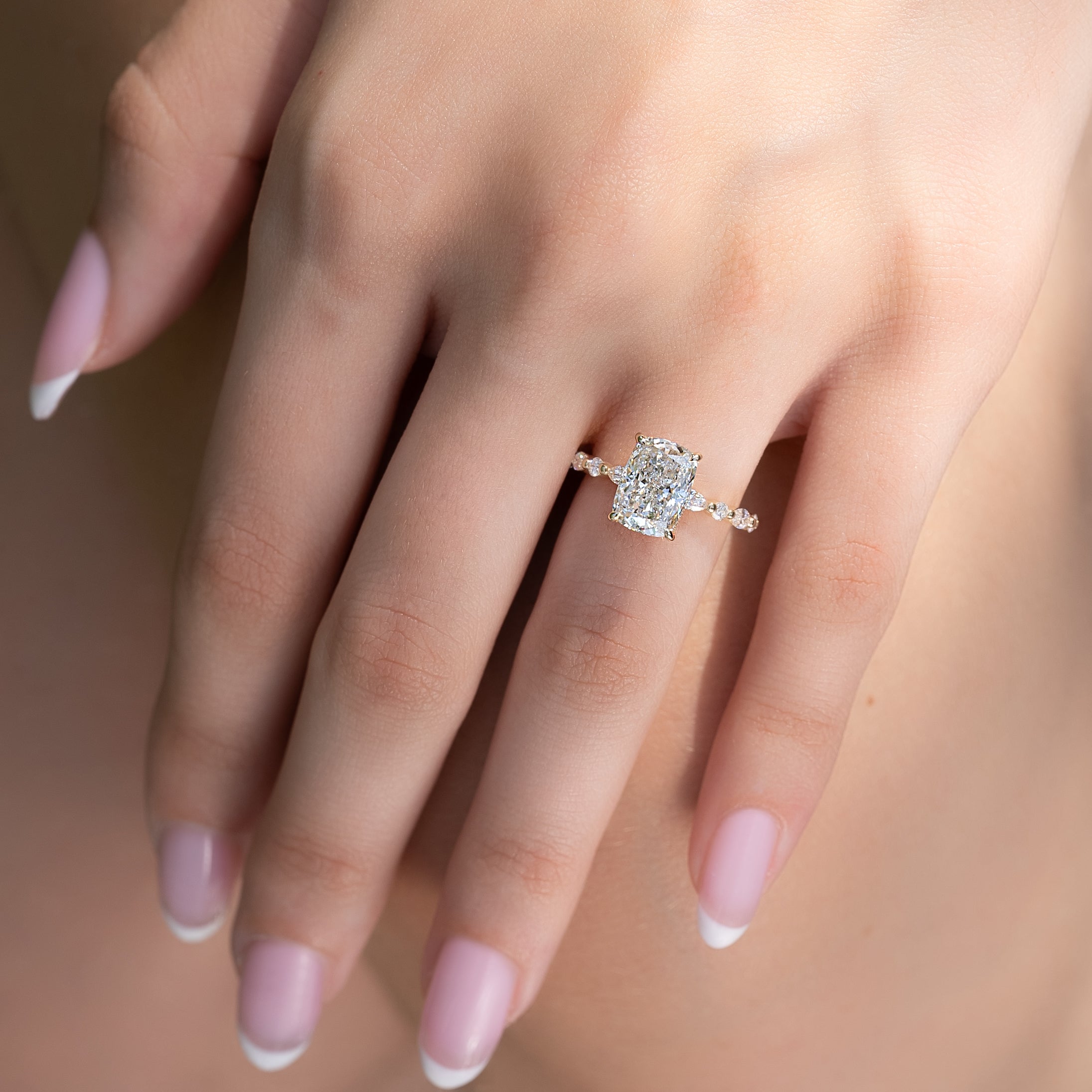 Elongated cushion cut CVD diamond hidden halo engagement ring with pave band in white gold