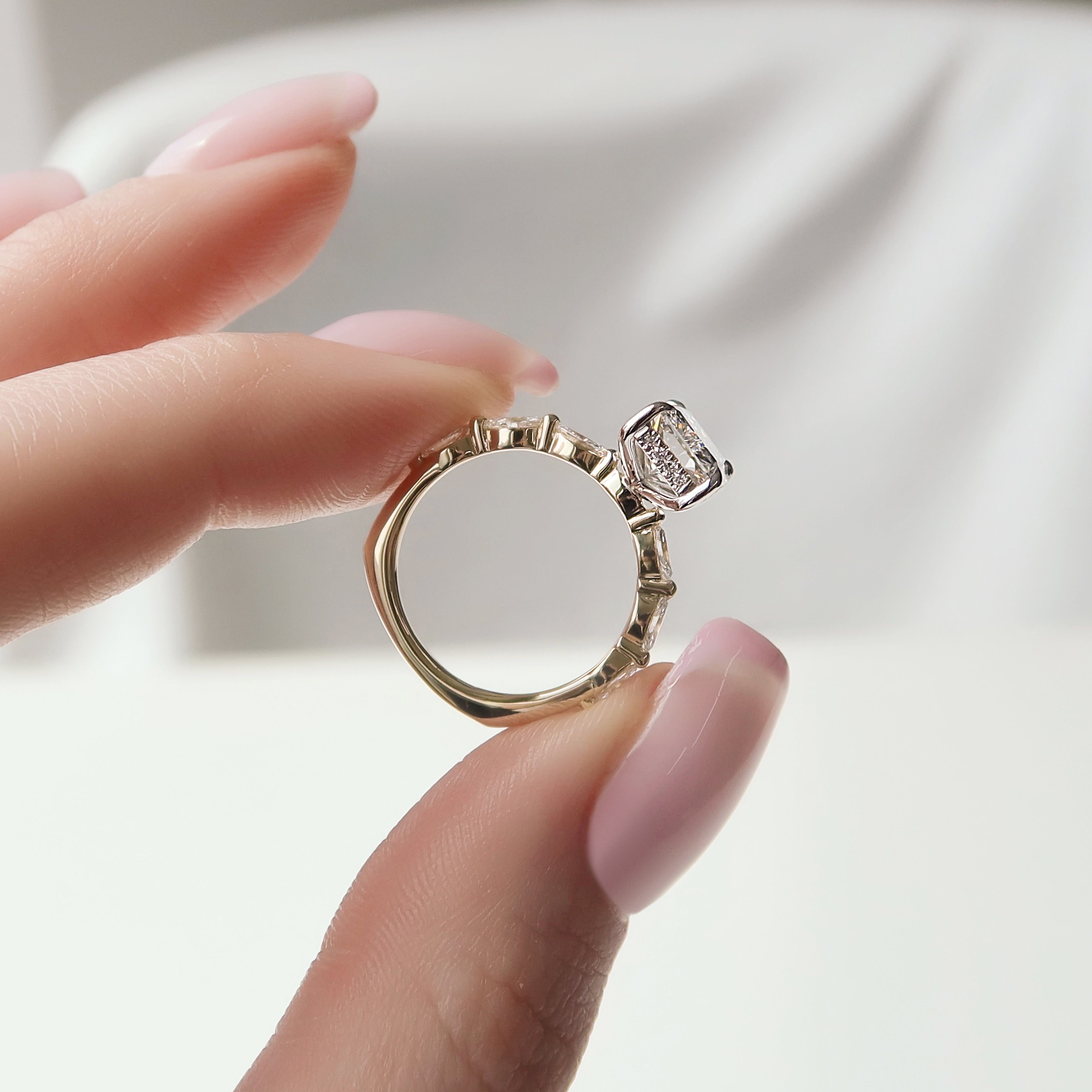 Radiant cut CVD diamond engagement ring with hidden halo and pave band in elegant solitaire-inspired style