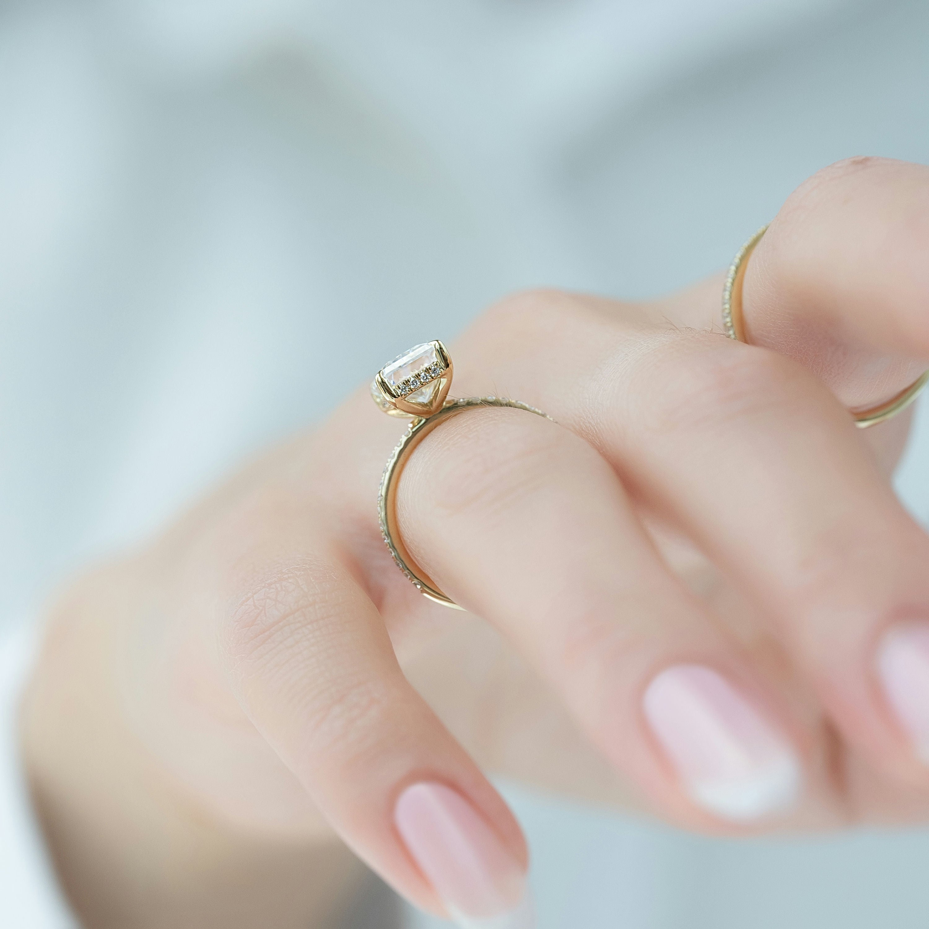 Radiant cut CVD diamond engagement ring with hidden halo and pave diamond band in white gold