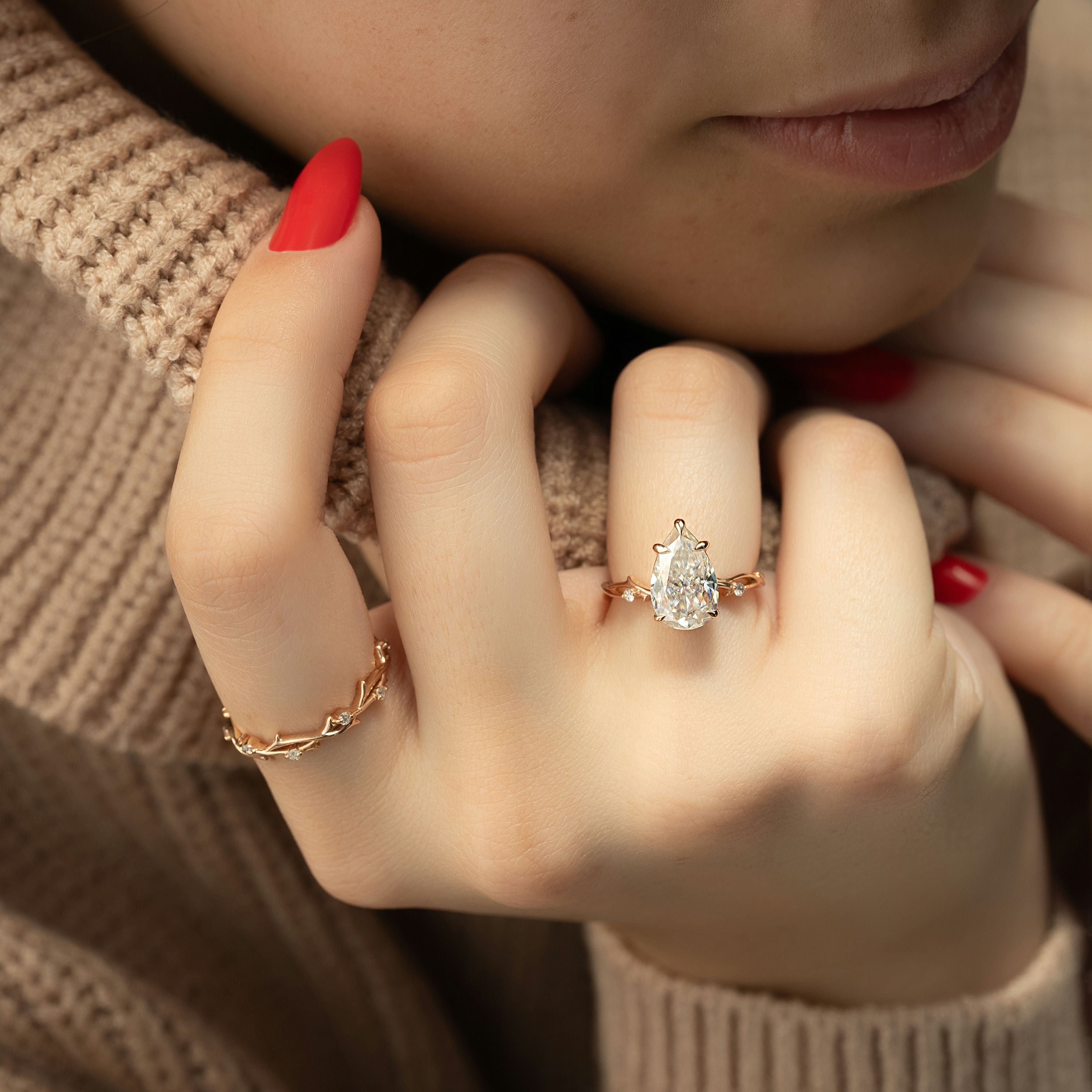 Pear cut CVD diamond engagement ring in twig-style band with organic detailing
