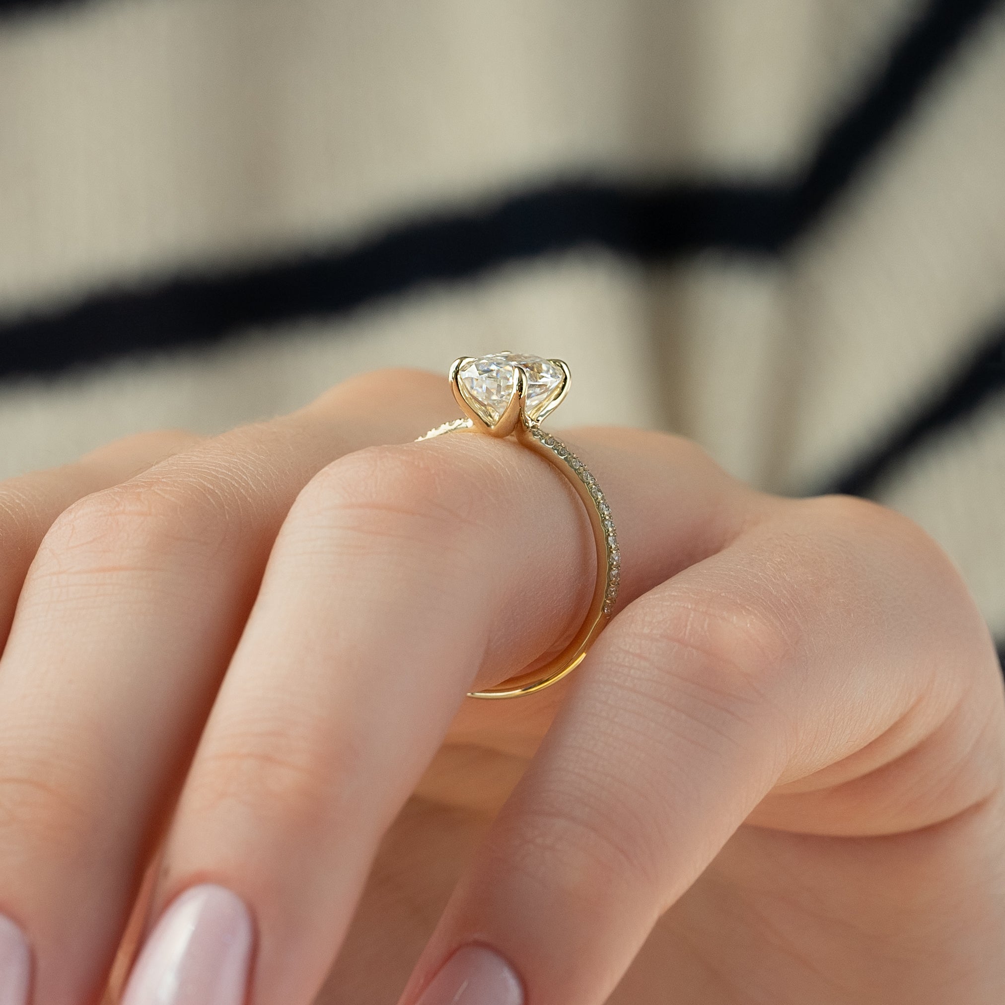 Oval cut CVD diamond pave engagement ring with slim diamond band in white gold