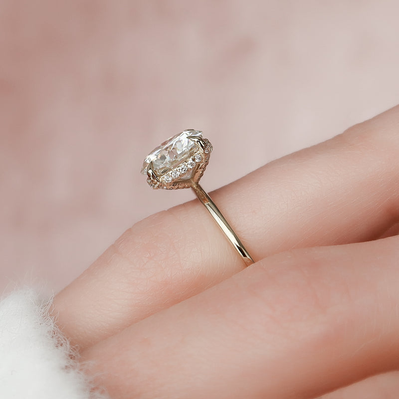 Round cut CVD diamond hidden halo engagement ring in white gold setting