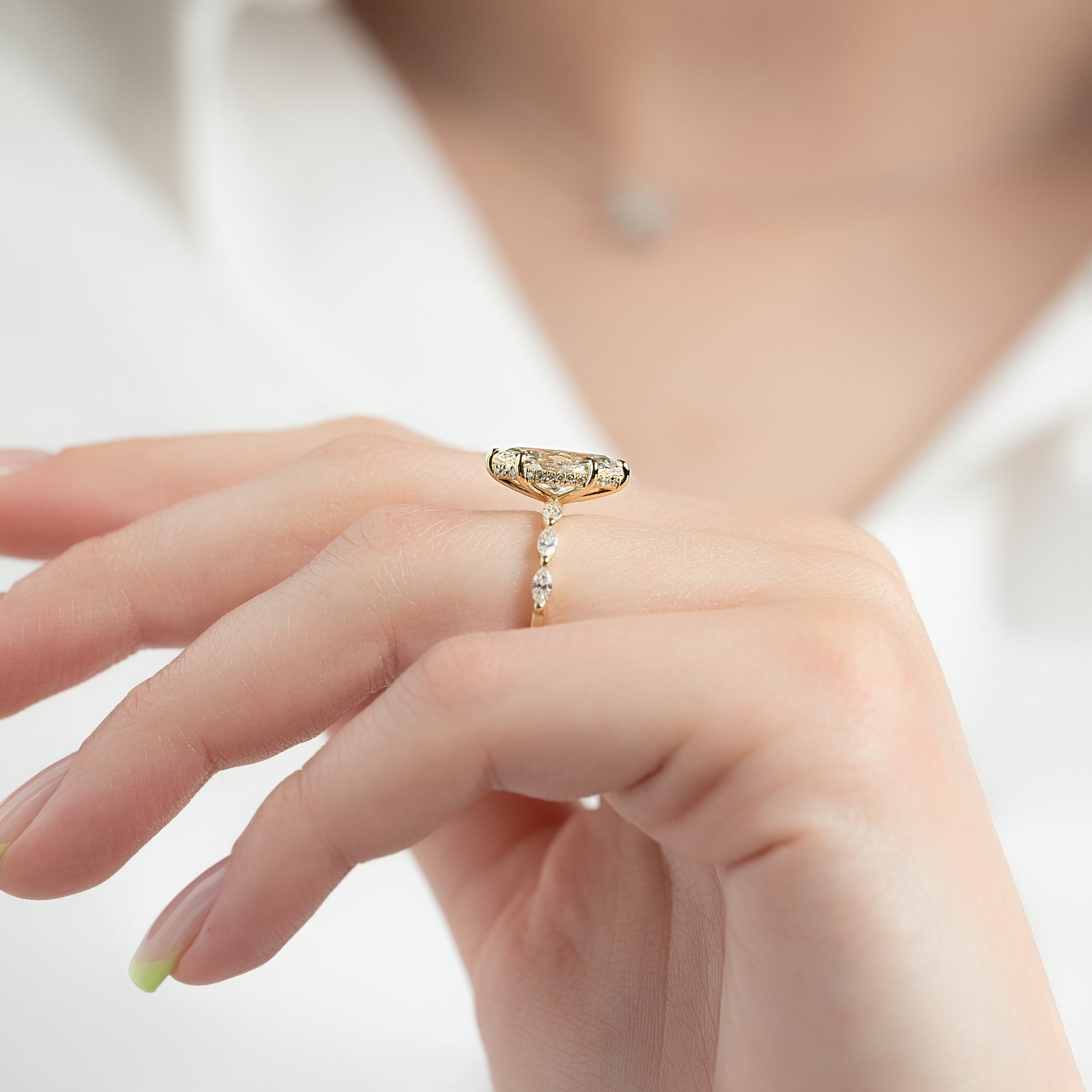 Marquise cut CVD diamond engagement ring with hidden halo and pave band in white gold