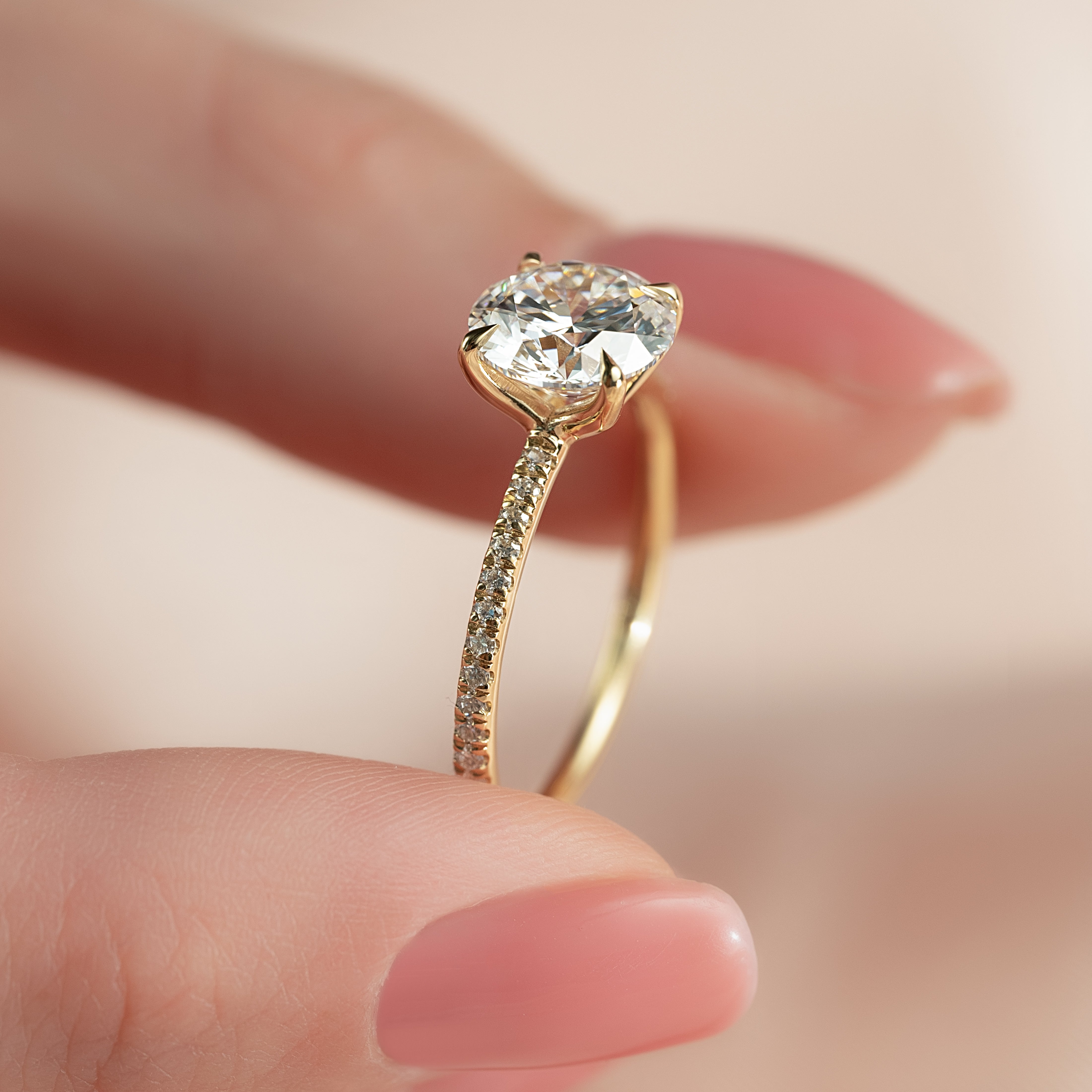 Round cut CVD diamond engagement ring featuring pave diamond band in platinum setting