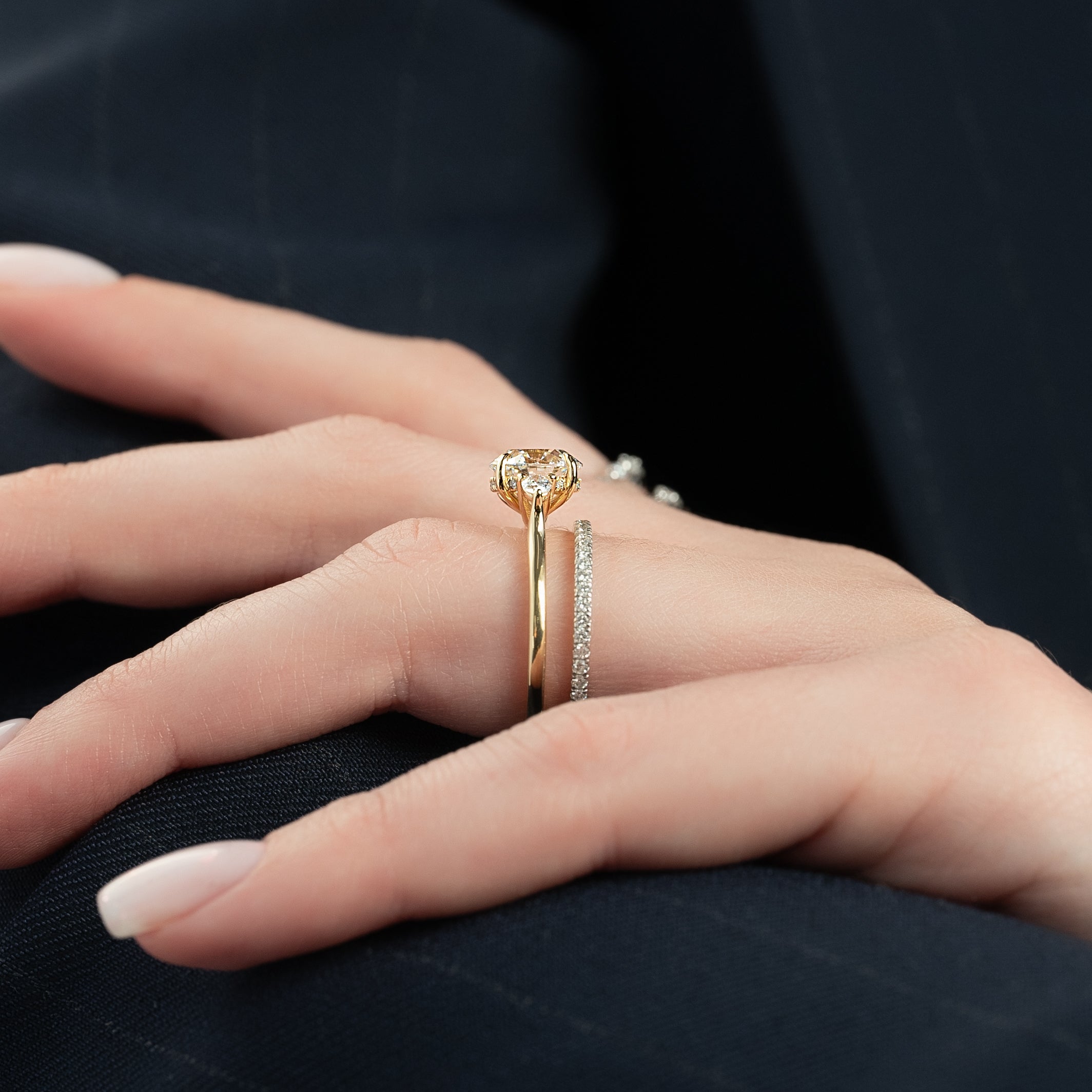 Round cut CVD diamond three-stone engagement ring in platinum setting