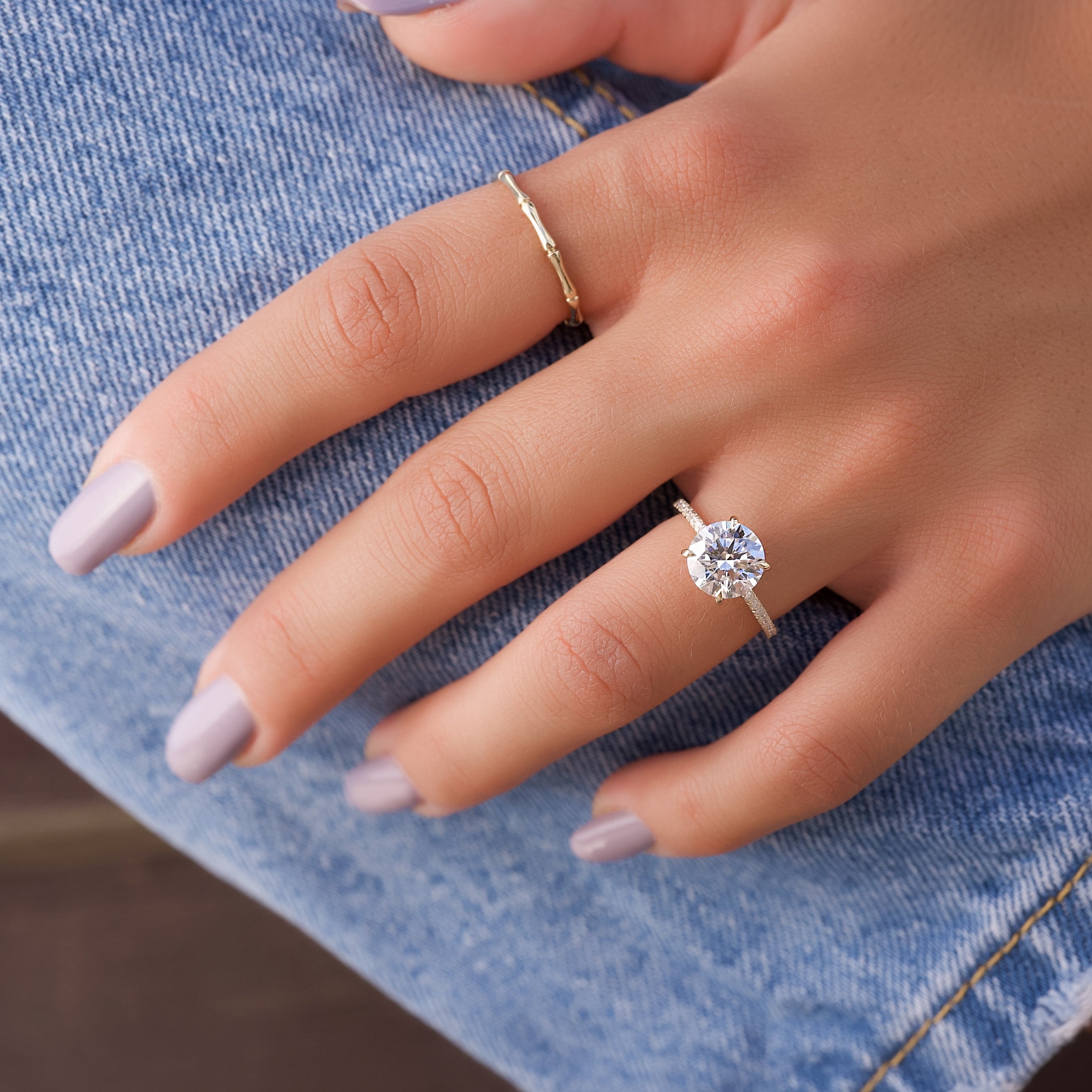 Round cut CVD diamond hidden halo engagement ring with pave band in white gold setting