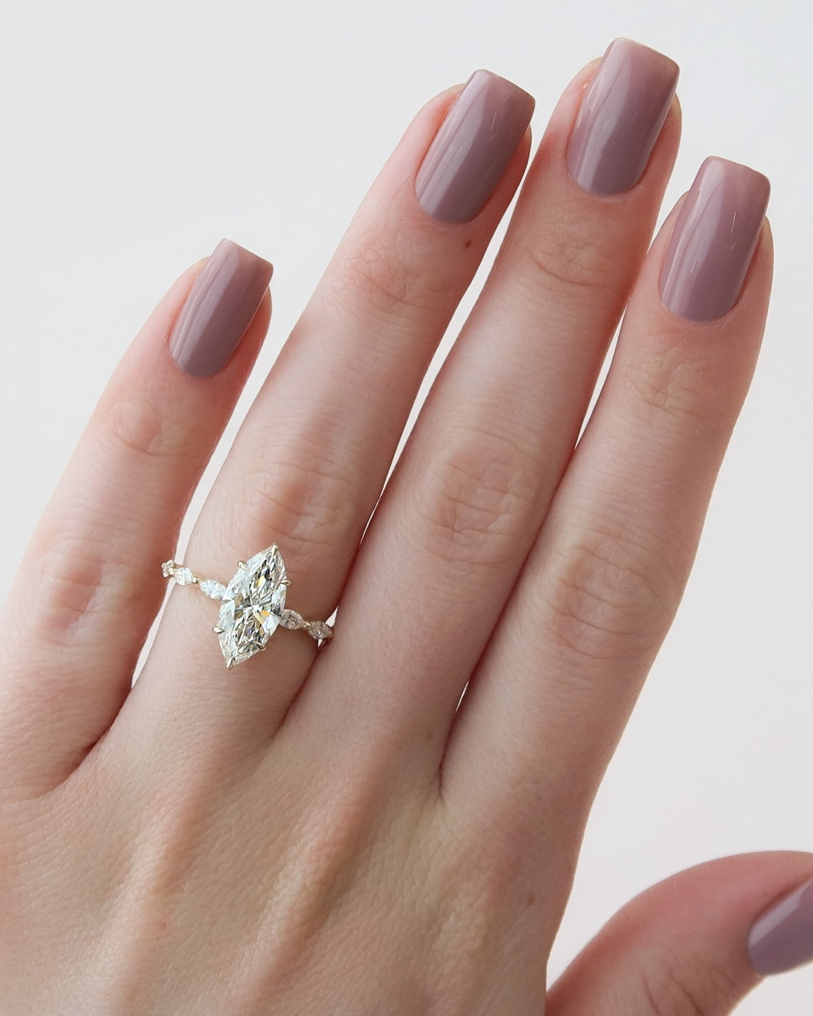 Marquise cut CVD diamond engagement ring with hidden halo and pave band in white gold