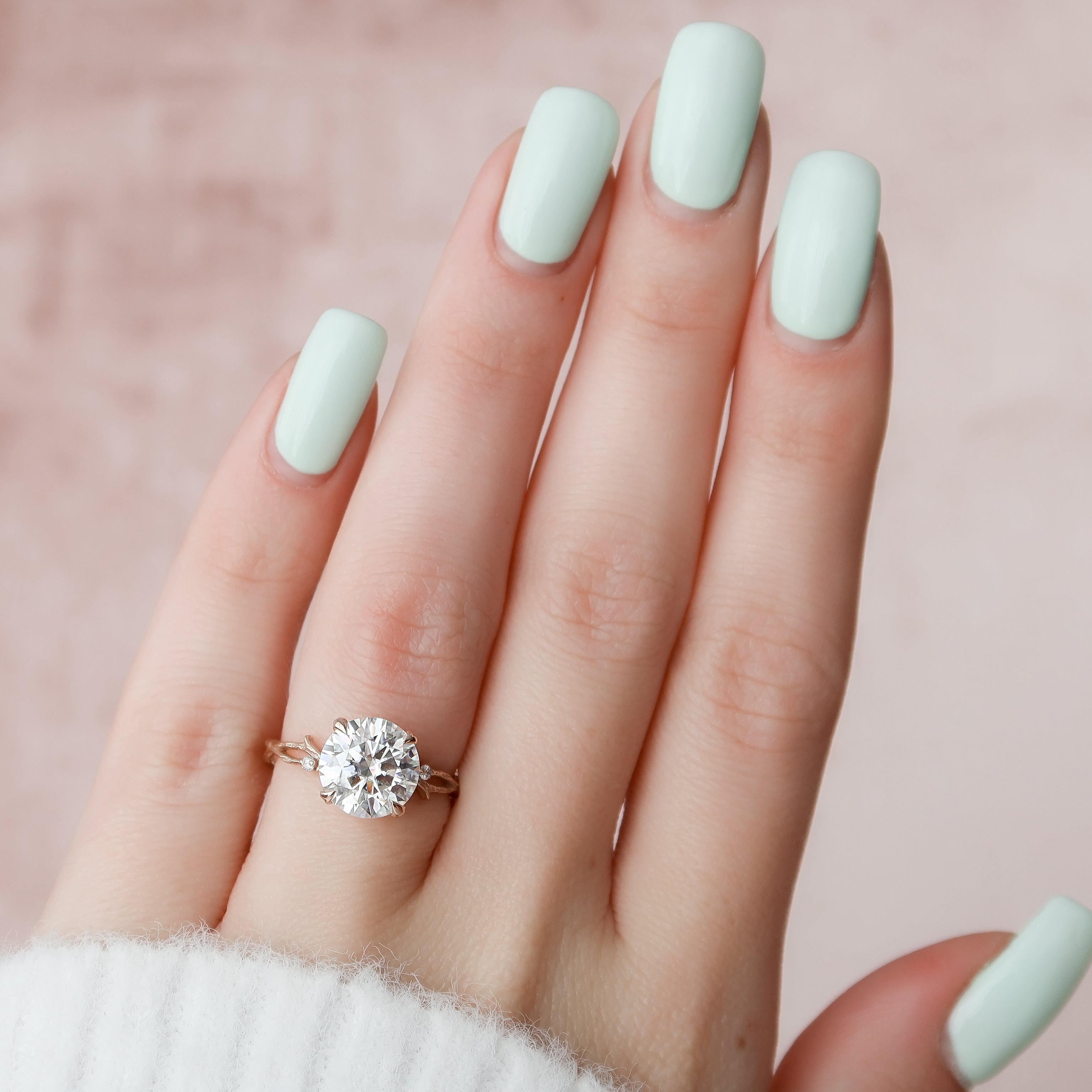 Round cut CVD diamond engagement ring with twig-inspired band in white gold