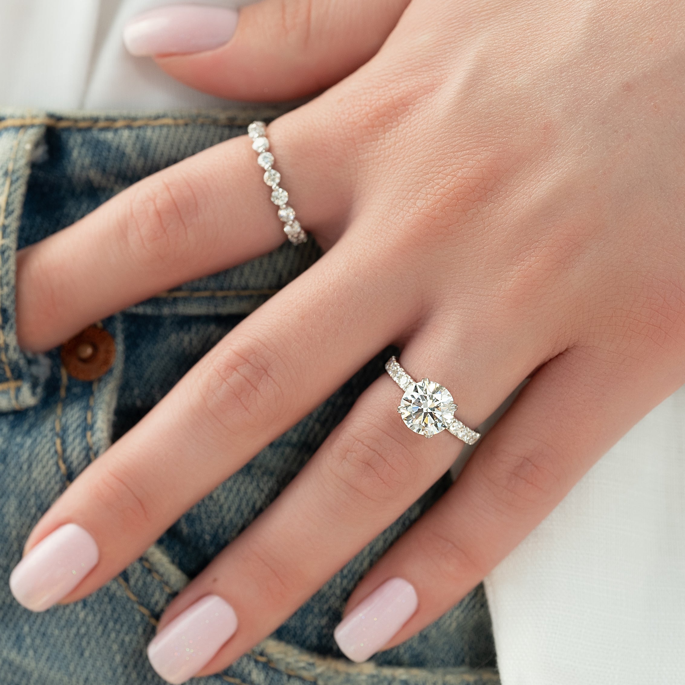 Round cut CVD diamond hidden halo engagement ring with pave band in white gold