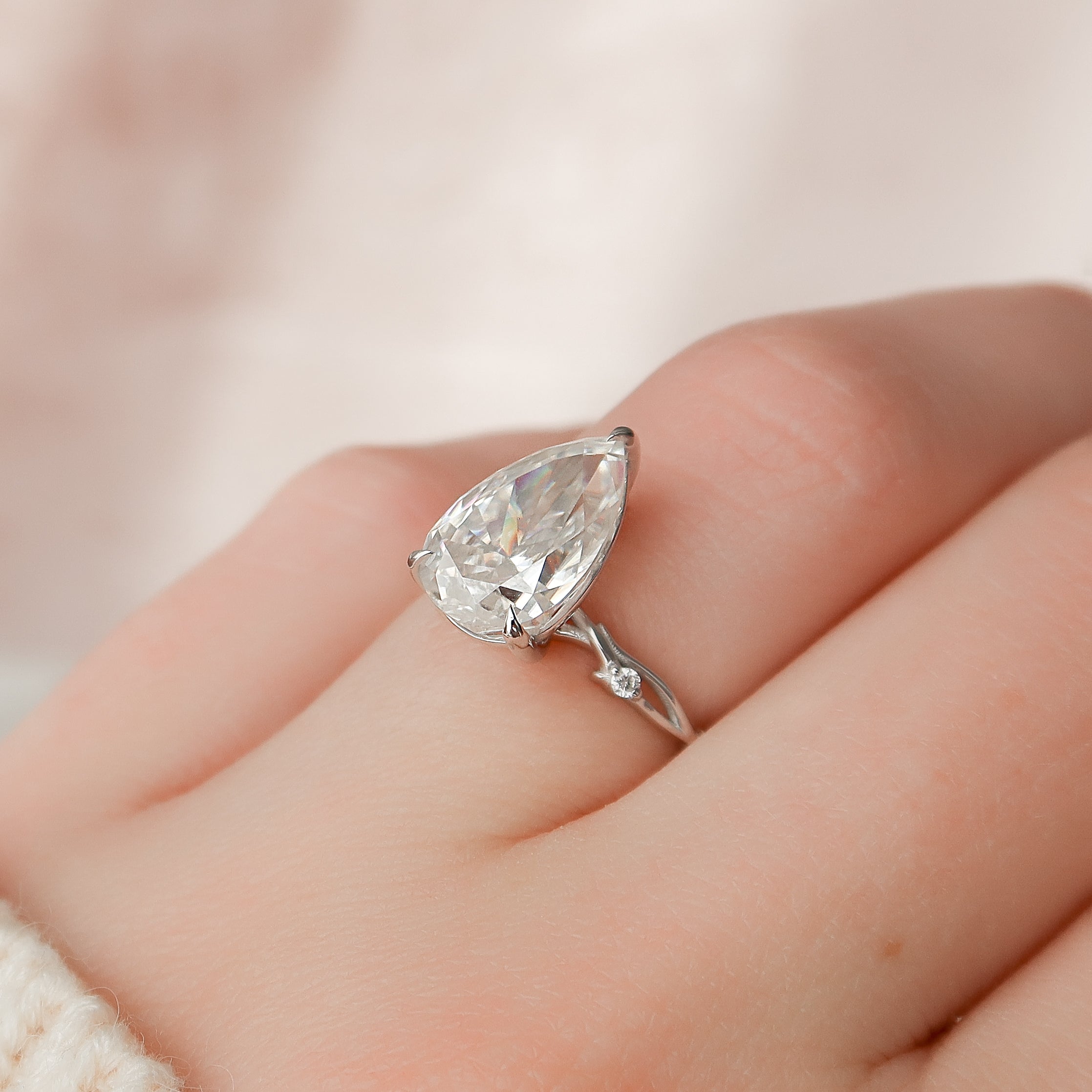 Pear cut CVD diamond engagement ring in twig-style band with organic detailing