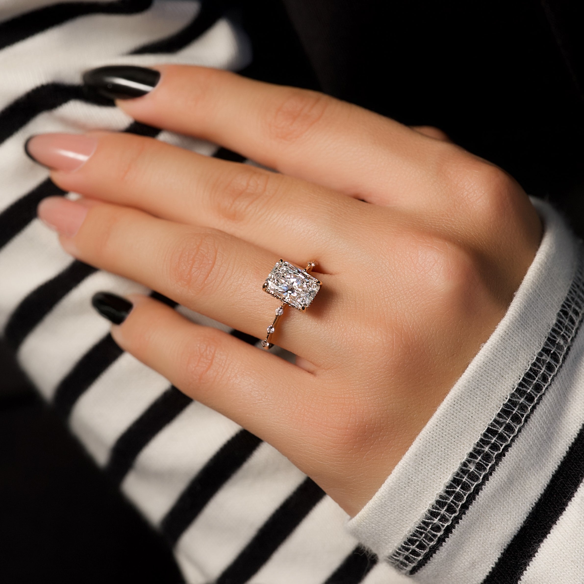 Radiant cut CVD diamond engagement ring with hidden halo in dainty platinum setting