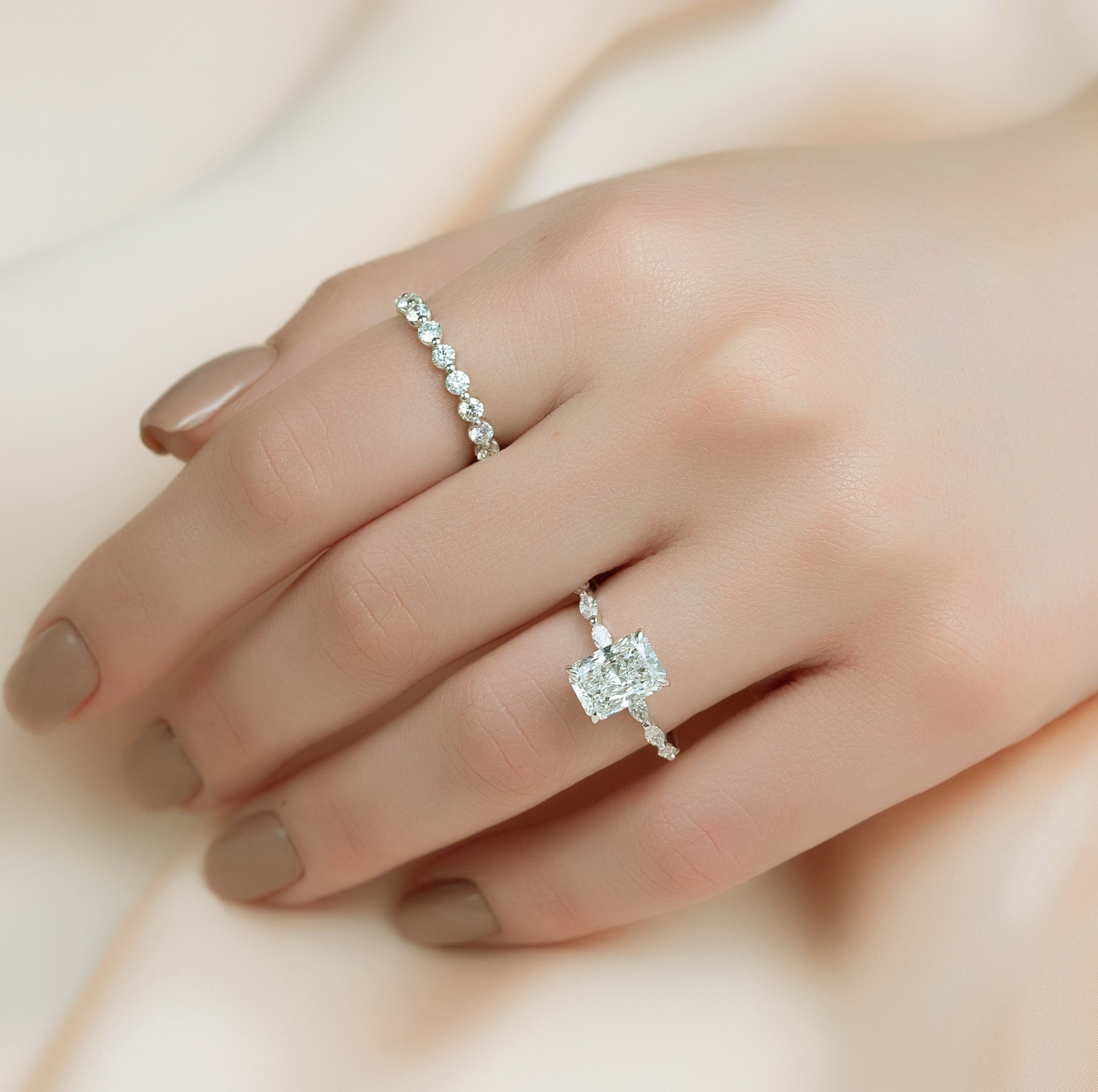 Radiant cut CVD diamond engagement ring with hidden halo and pave band in elegant solitaire-inspired style