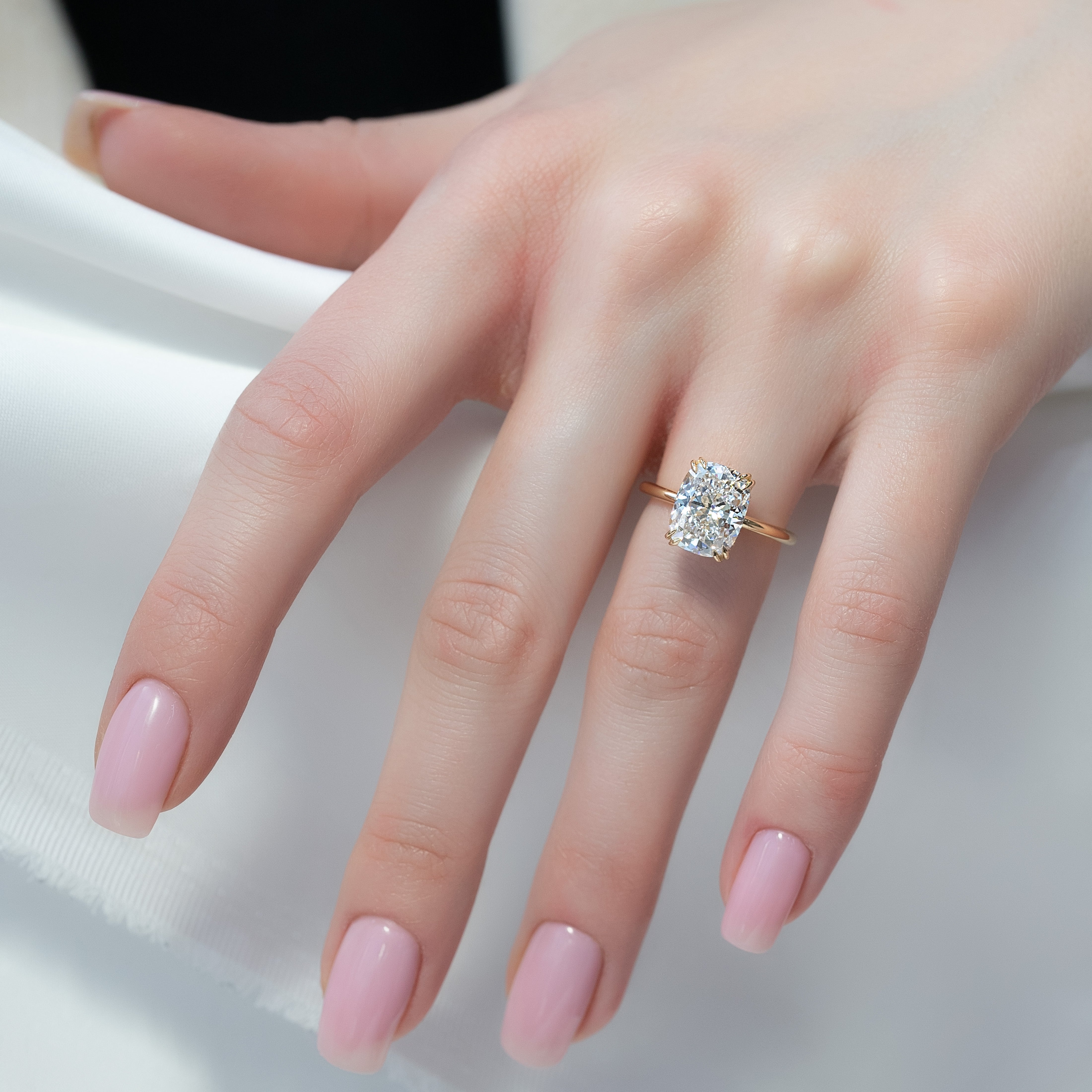 Elongated cushion cut CVD diamond engagement ring with hidden halo setting in white gold