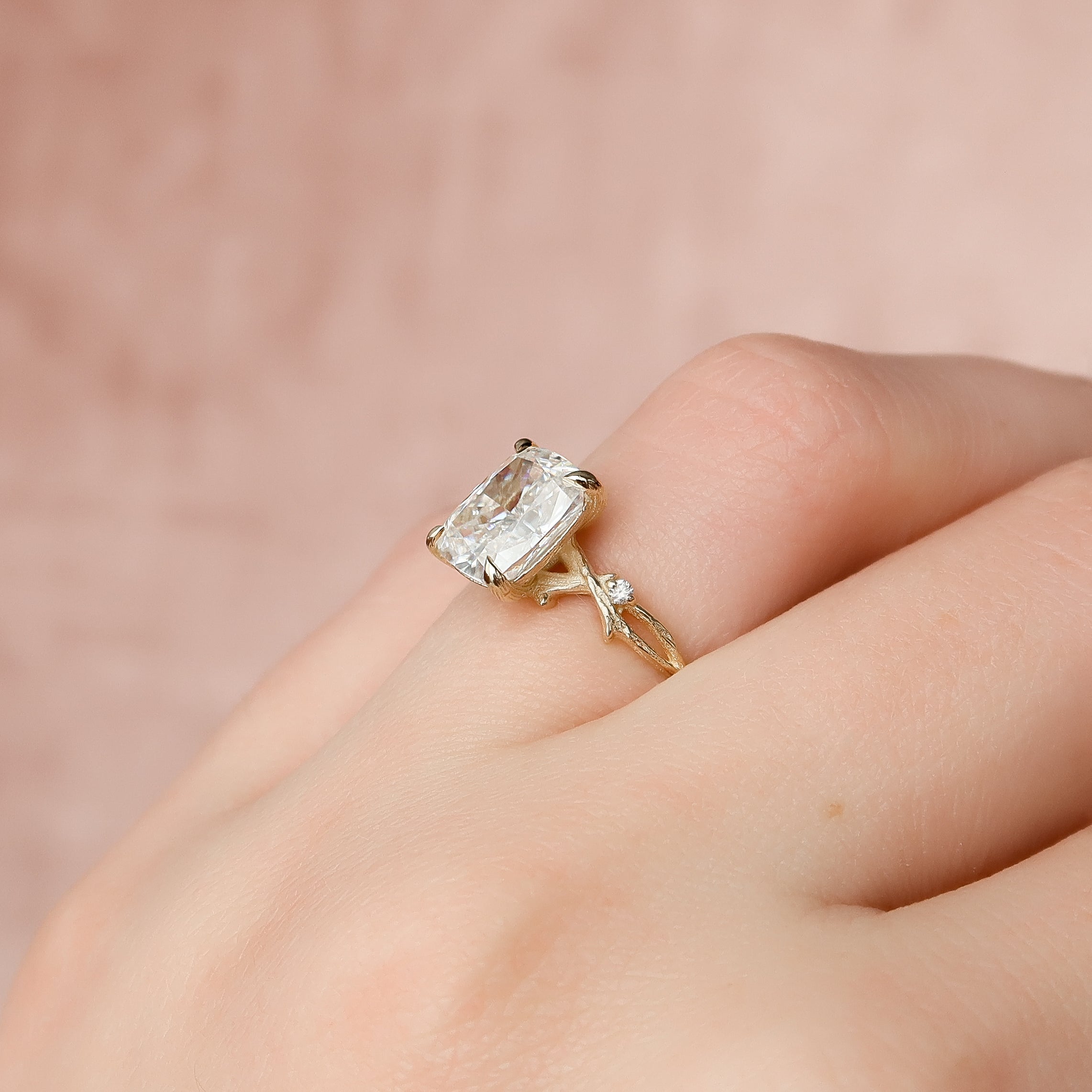 Elongated cushion cut CVD diamond engagement ring with twig-style band design