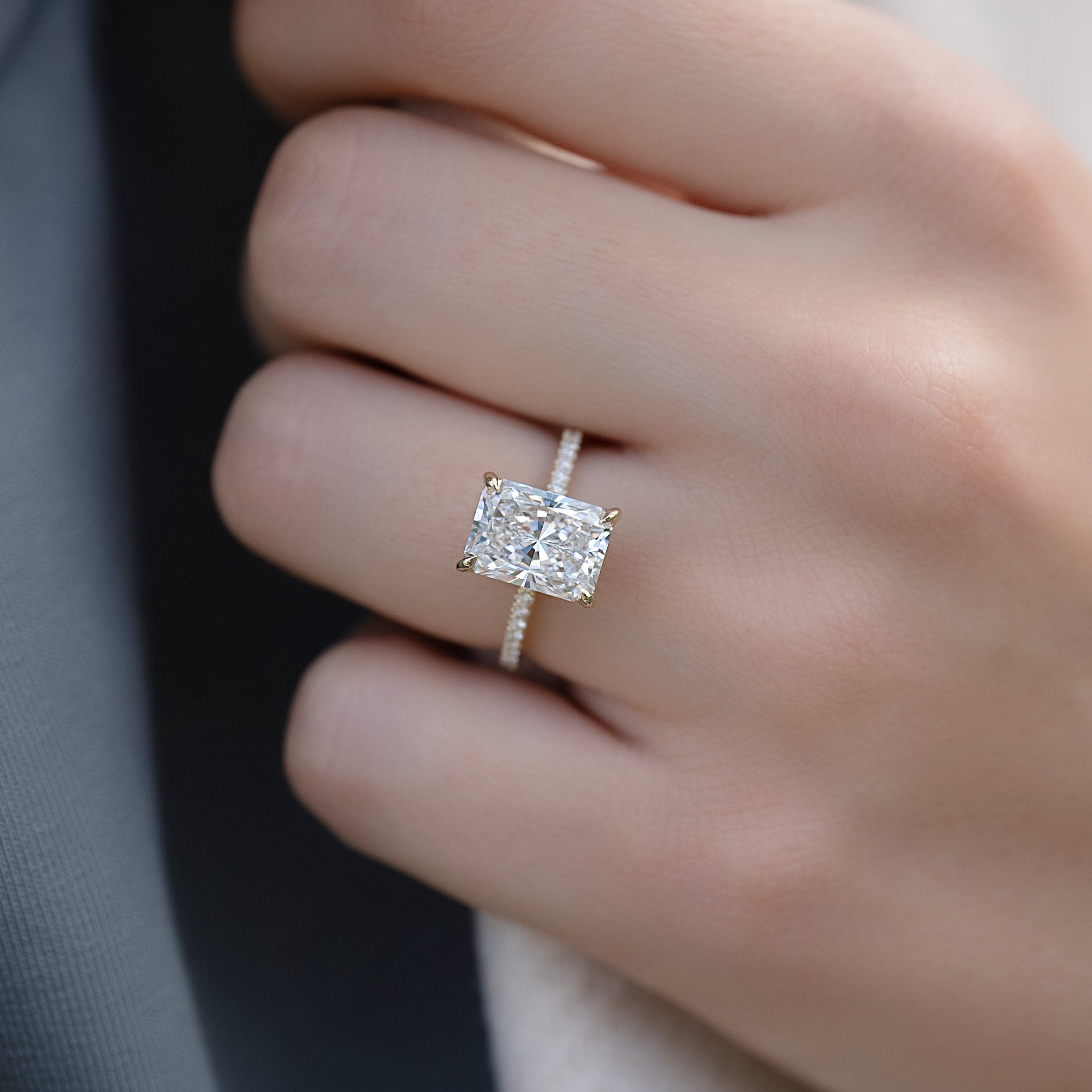 Radiant cut CVD diamond engagement ring with hidden halo and pave diamond band in white gold