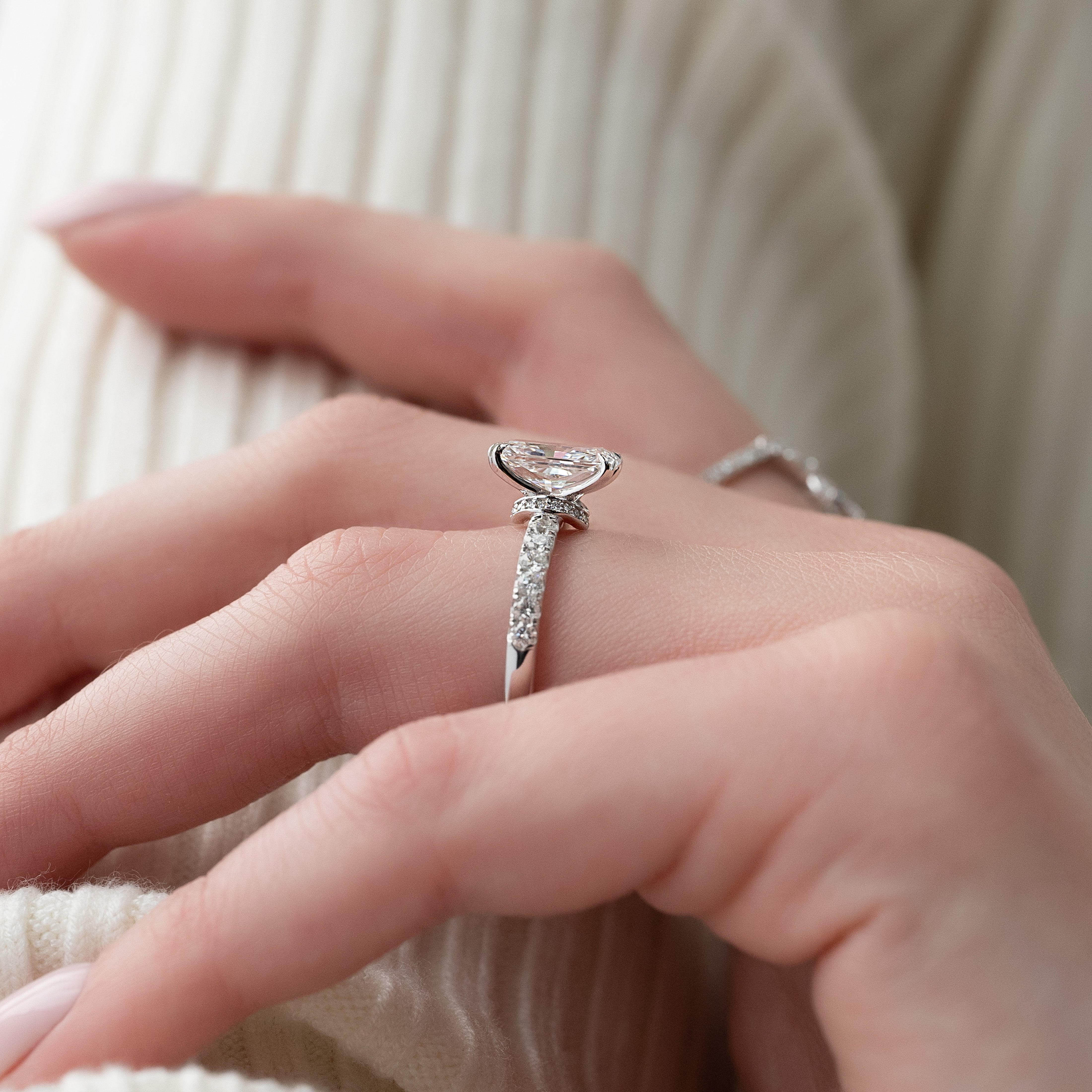 Radiant cut CVD diamond engagement ring with hidden halo and pave setting