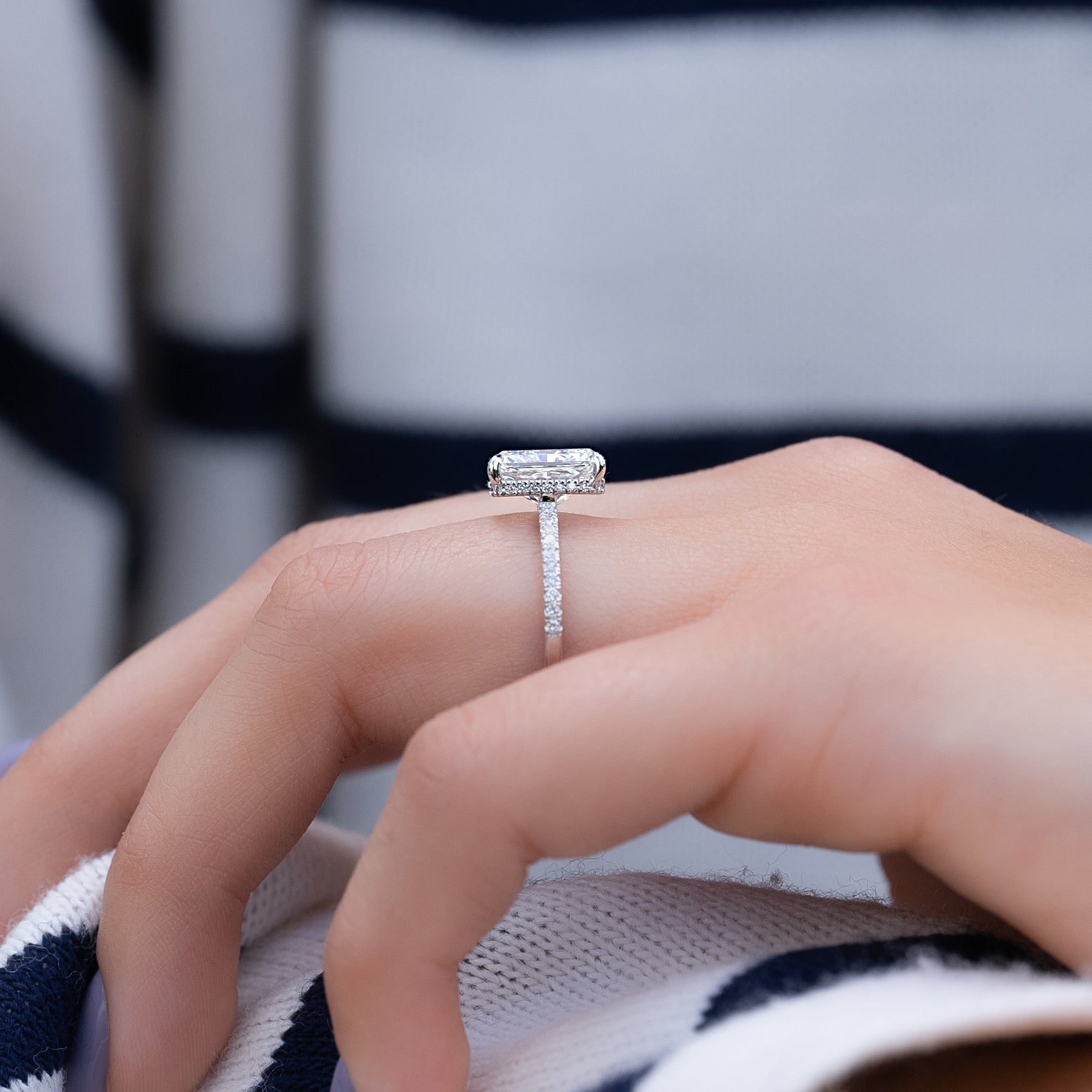 Radiant cut CVD diamond engagement ring with hidden halo and pave diamond band in platinum setting