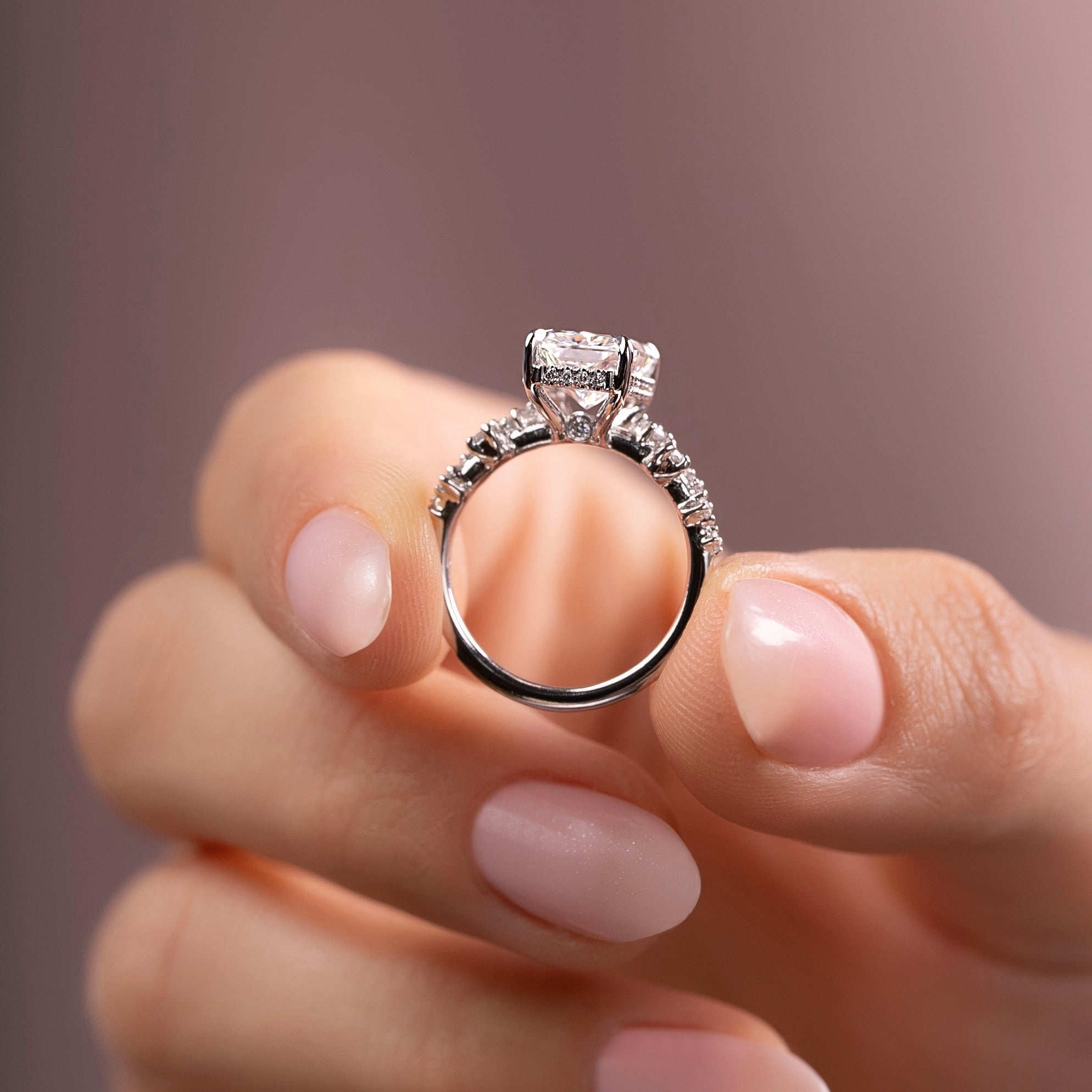 Radiant cut CVD diamond engagement ring with hidden halo and clustered diamond detailing in white gold