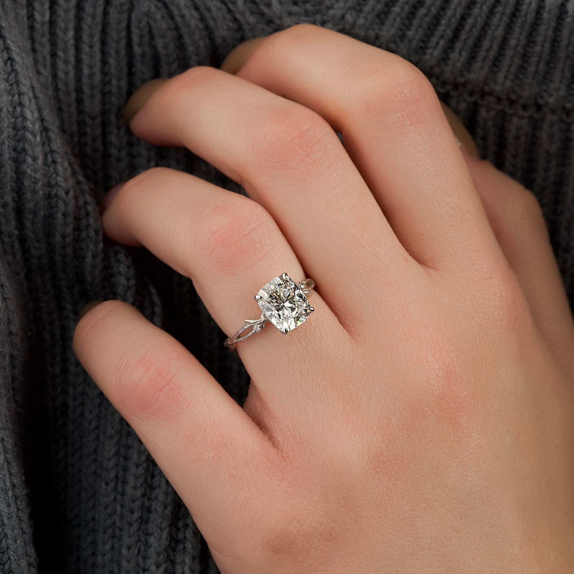 Elongated cushion cut CVD diamond engagement ring with twig-style band design