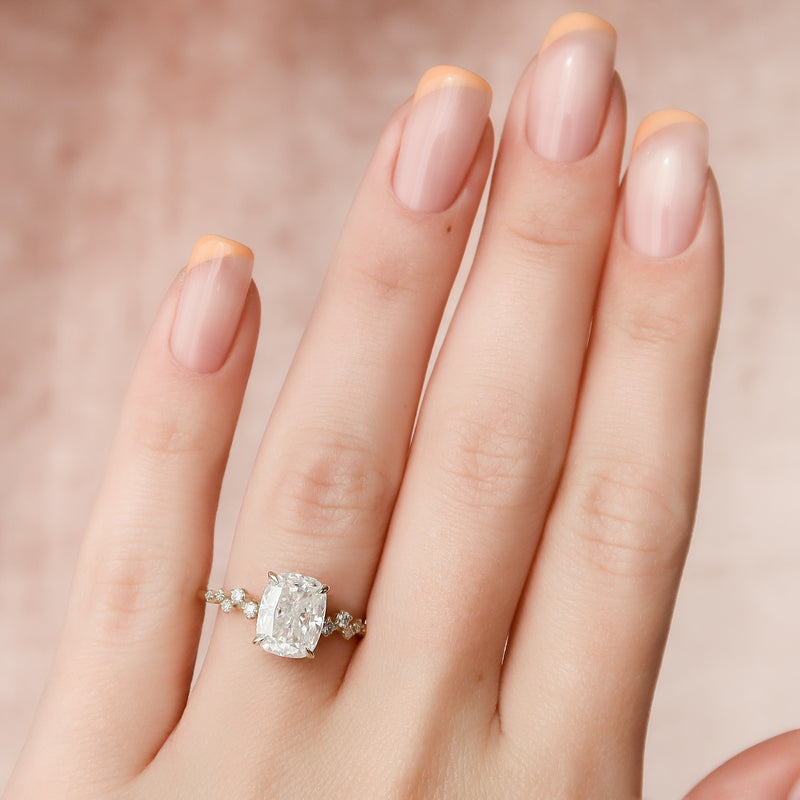 Elongated cushion cut moissanite cluster engagement ring in platinum setting, 2.0-4.0 CT