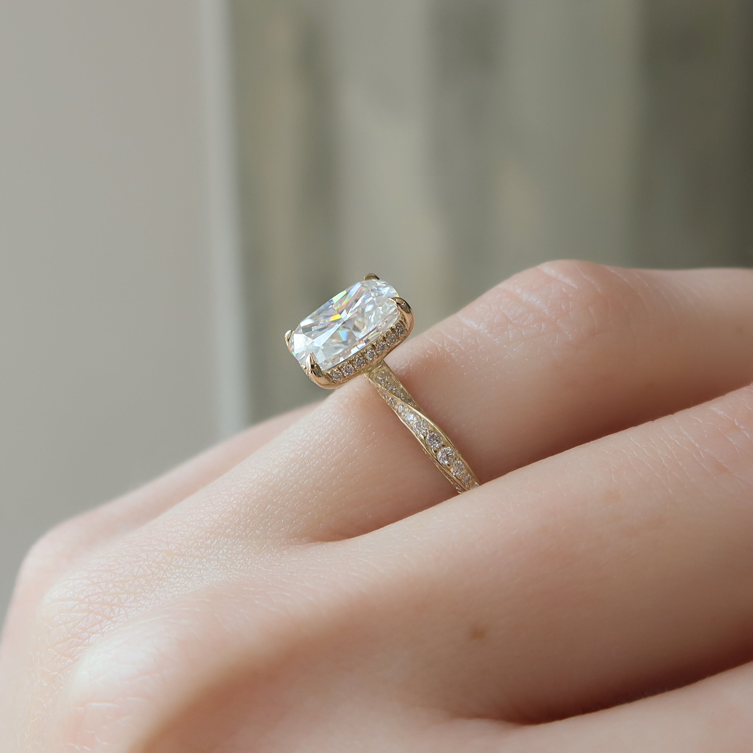 Elongated cushion cut CVD diamond twisted pave engagement ring in white gold