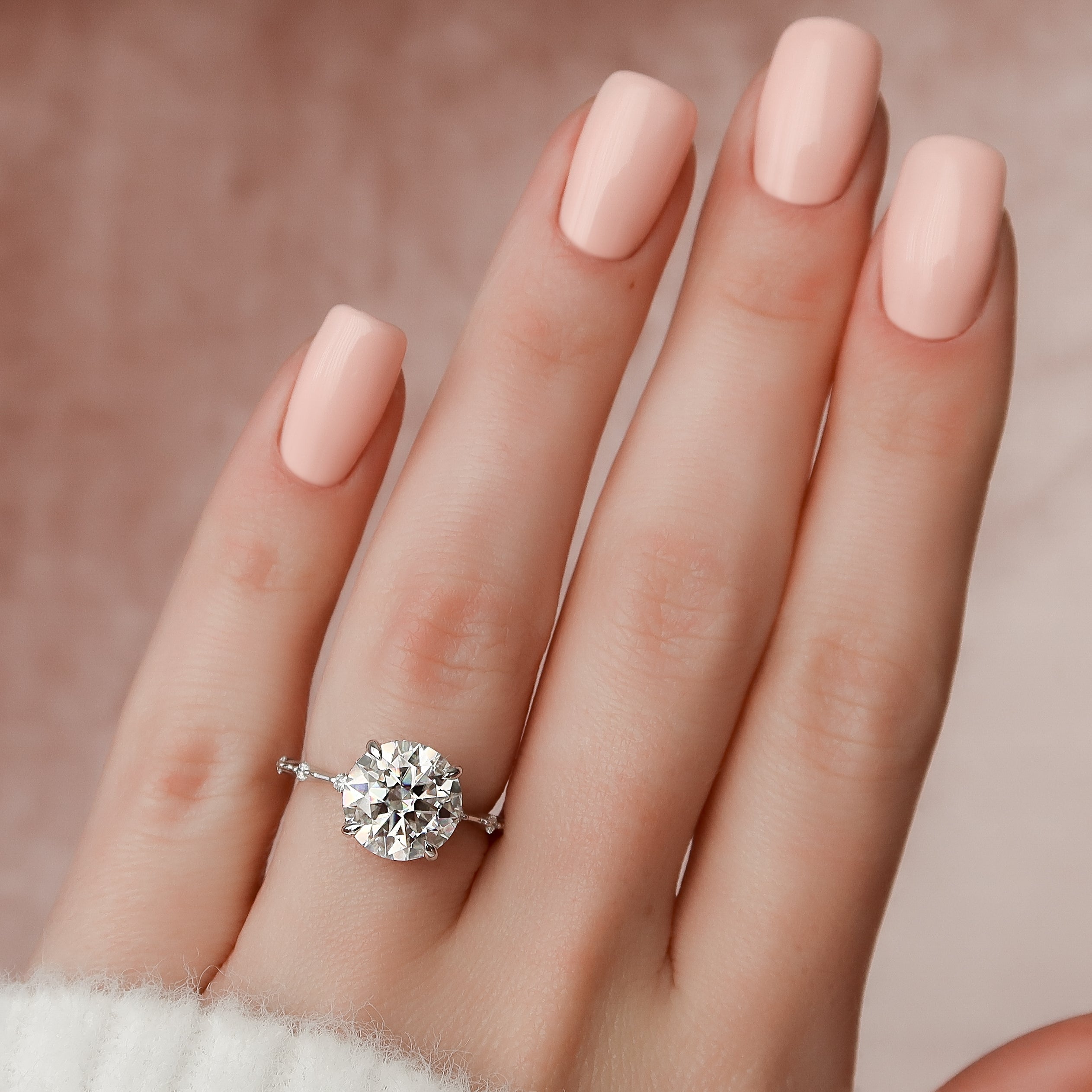 Round cut CVD diamond engagement ring with hidden halo and pave band in white gold