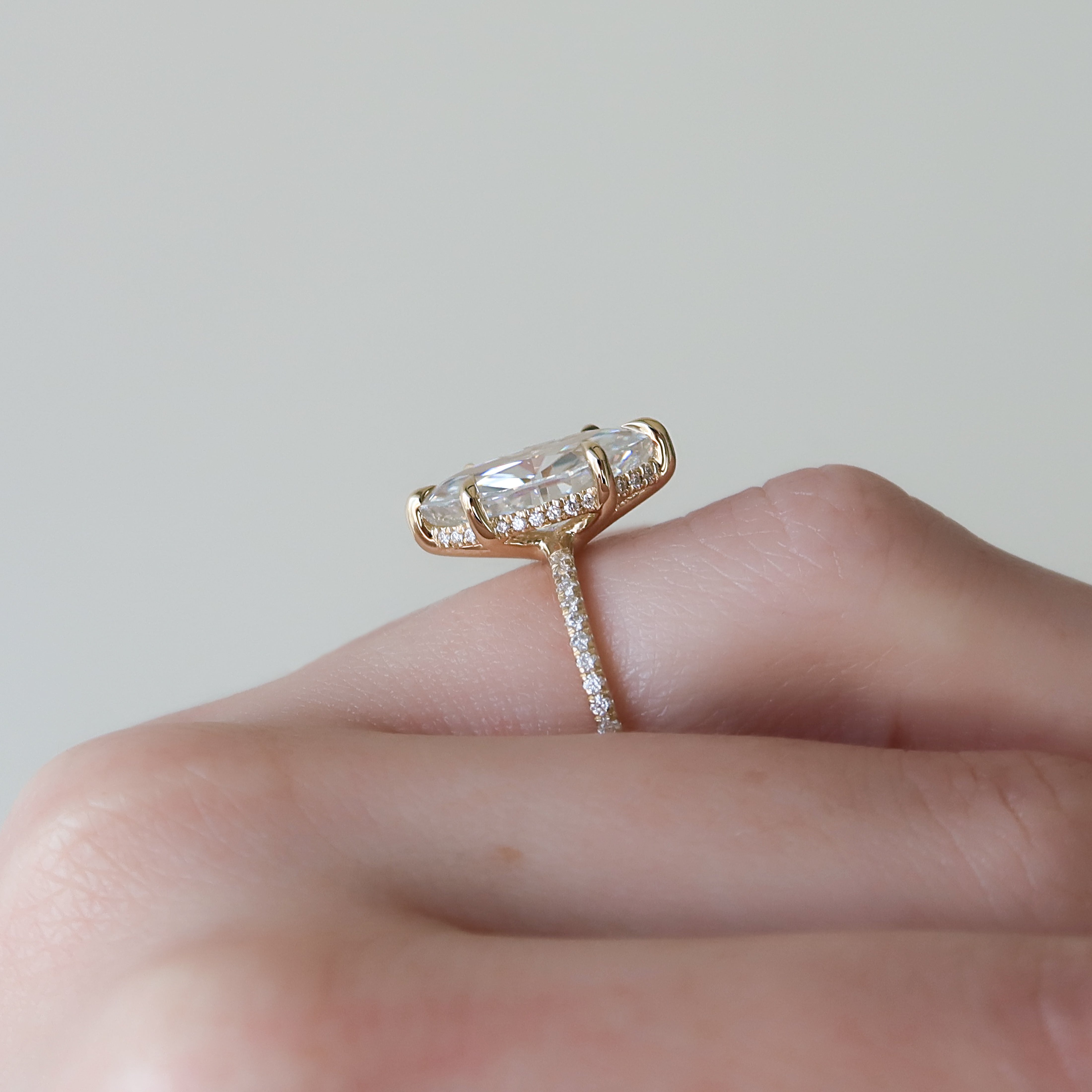 Marquise cut CVD diamond engagement ring with hidden halo and pave diamond band in white gold