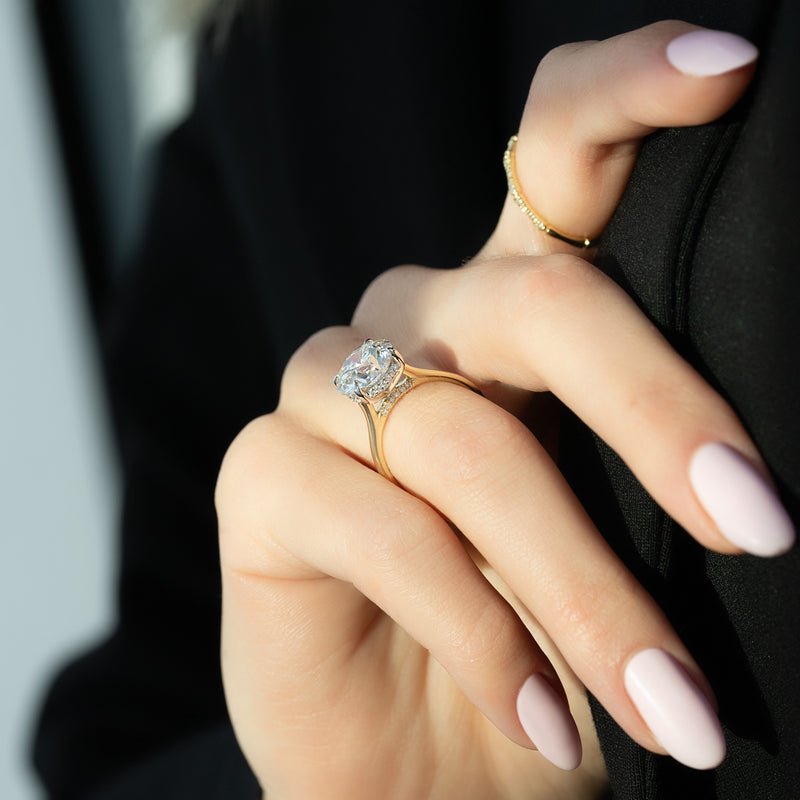 Round cut CVD diamond hidden halo engagement ring in white gold setting