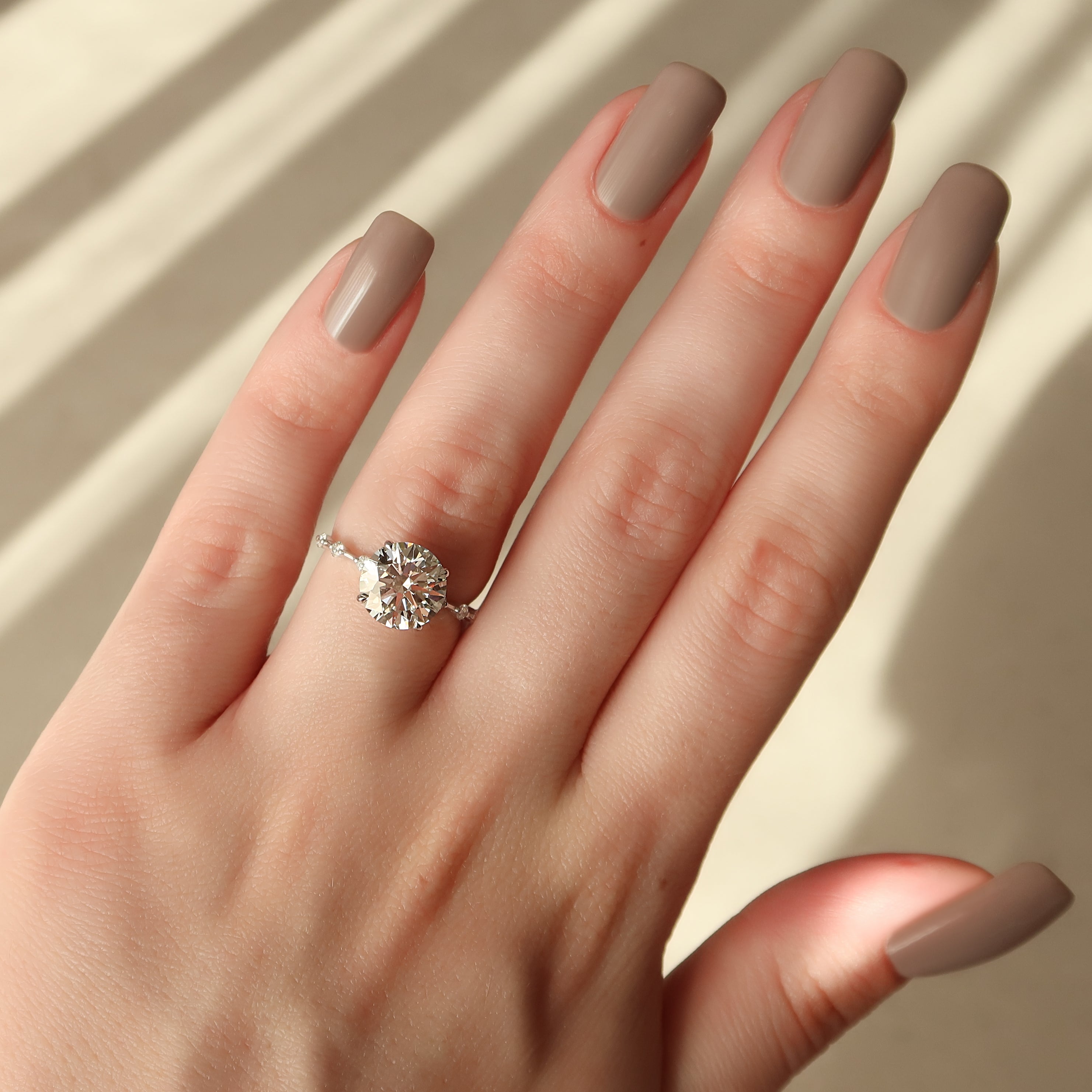 Round cut CVD diamond dainty engagement ring with slim band in white gold