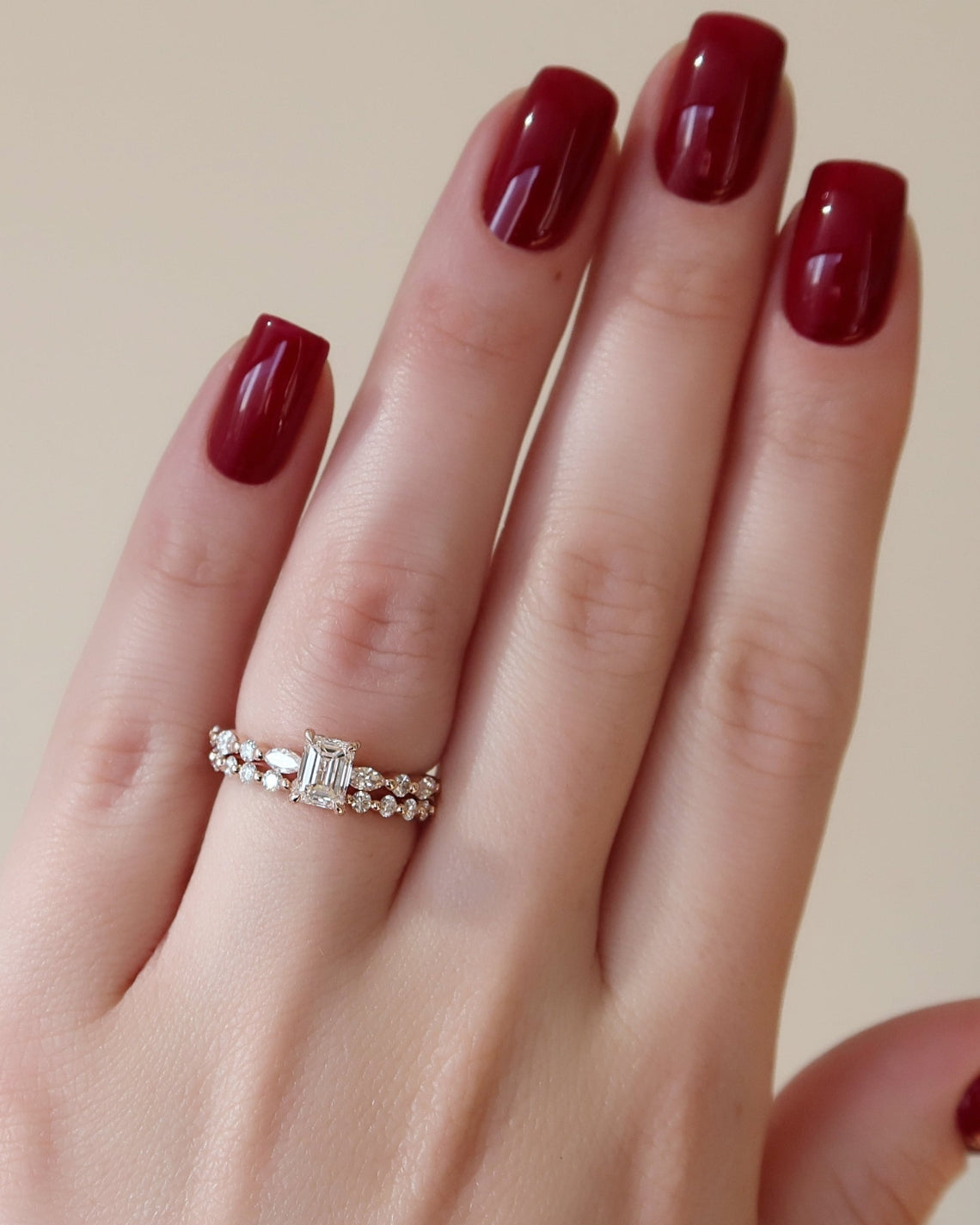 Emerald cut CVD diamond hidden halo engagement ring in white gold setting