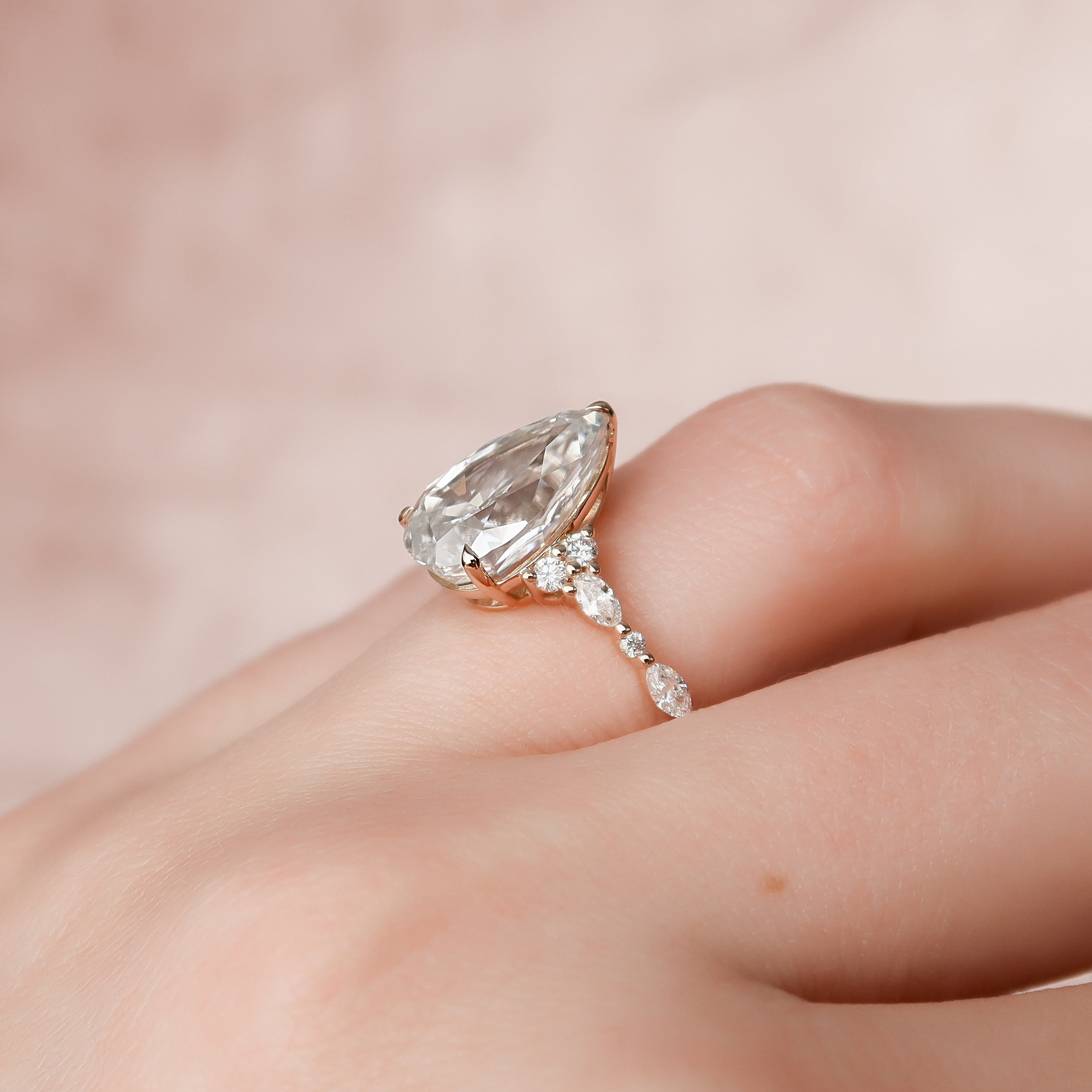 Pear cut CVD diamond cluster engagement ring in white gold setting