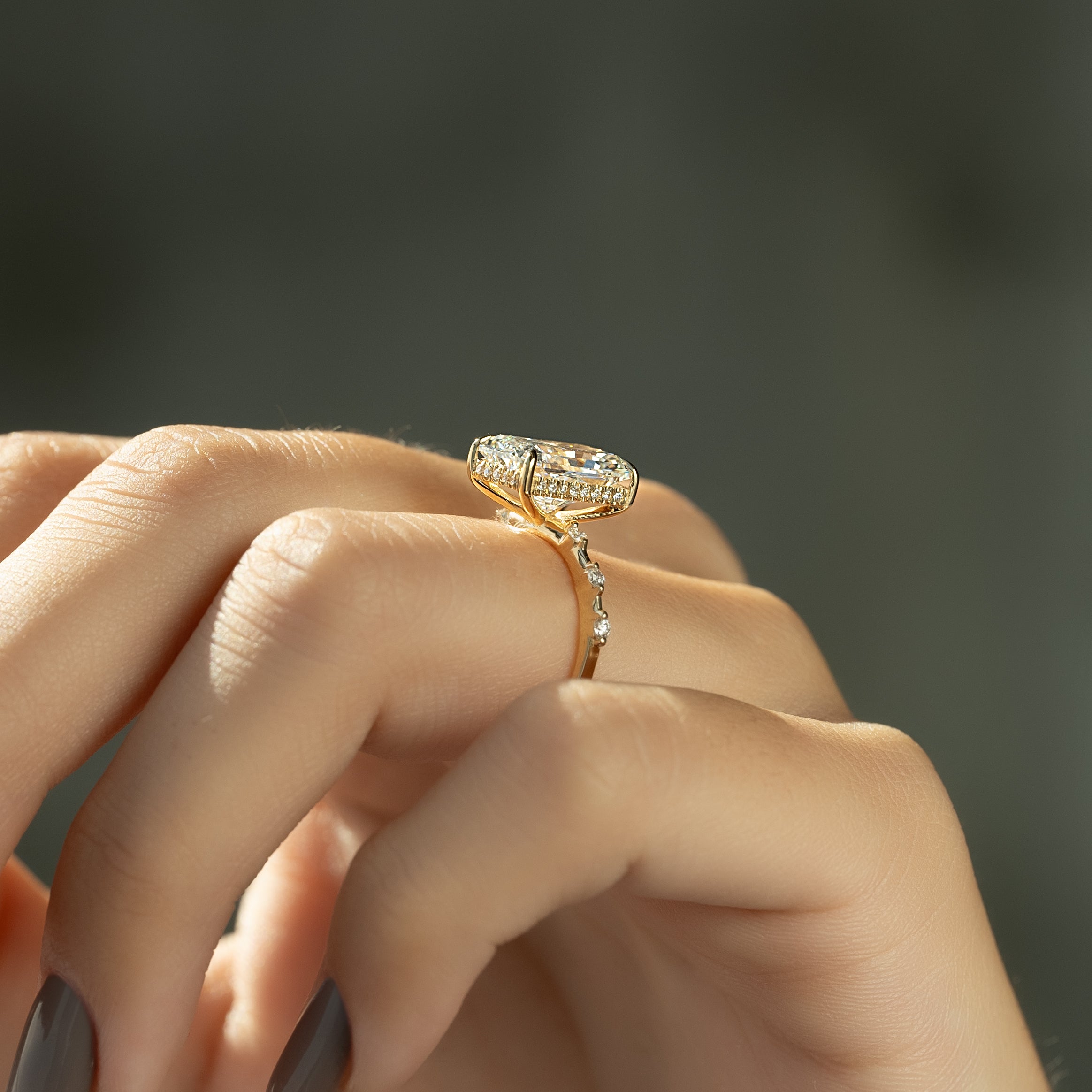 Radiant cut CVD diamond engagement ring with hidden halo in dainty platinum setting