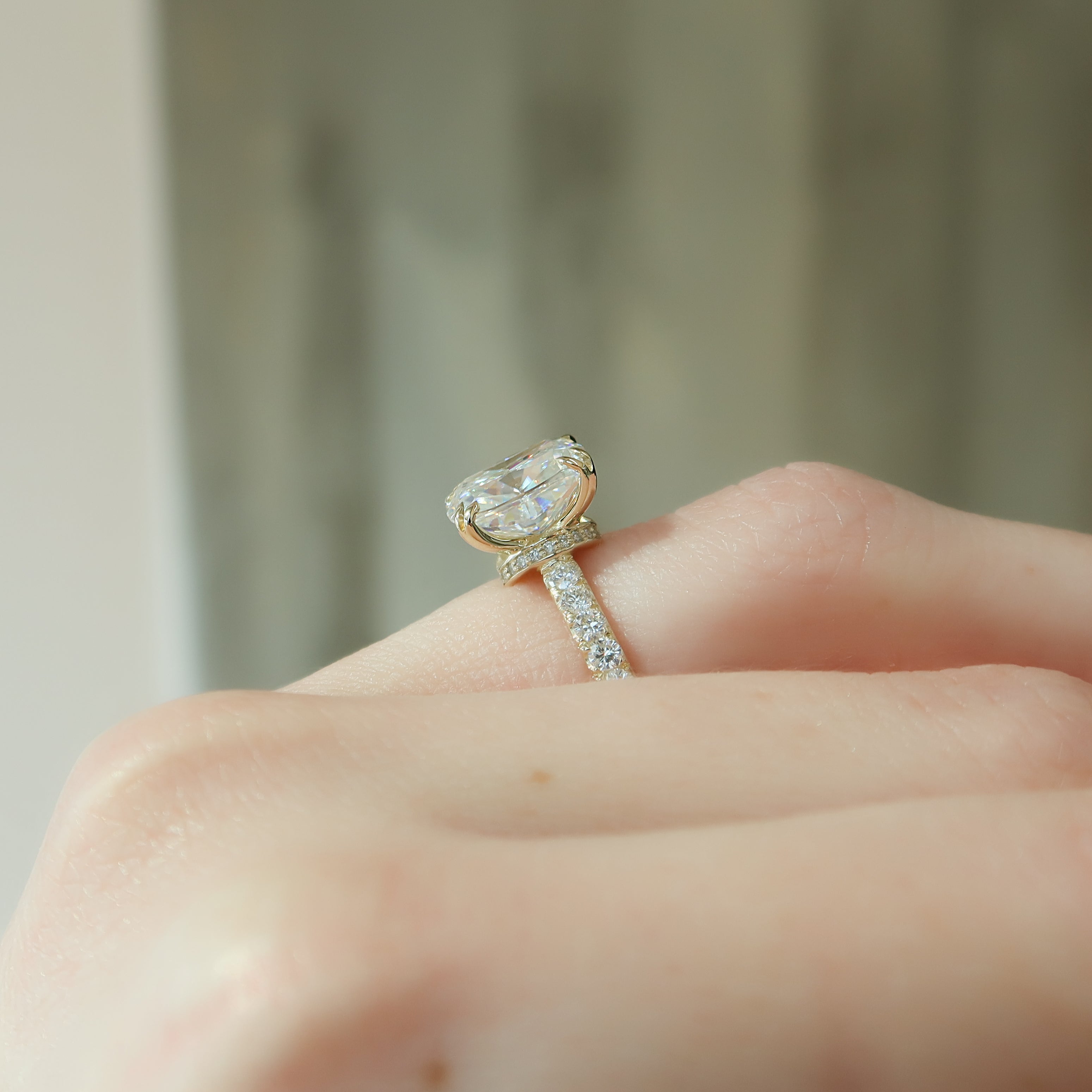 Elongated cushion cut CVD diamond engagement ring with hidden halo and pave setting in rose gold