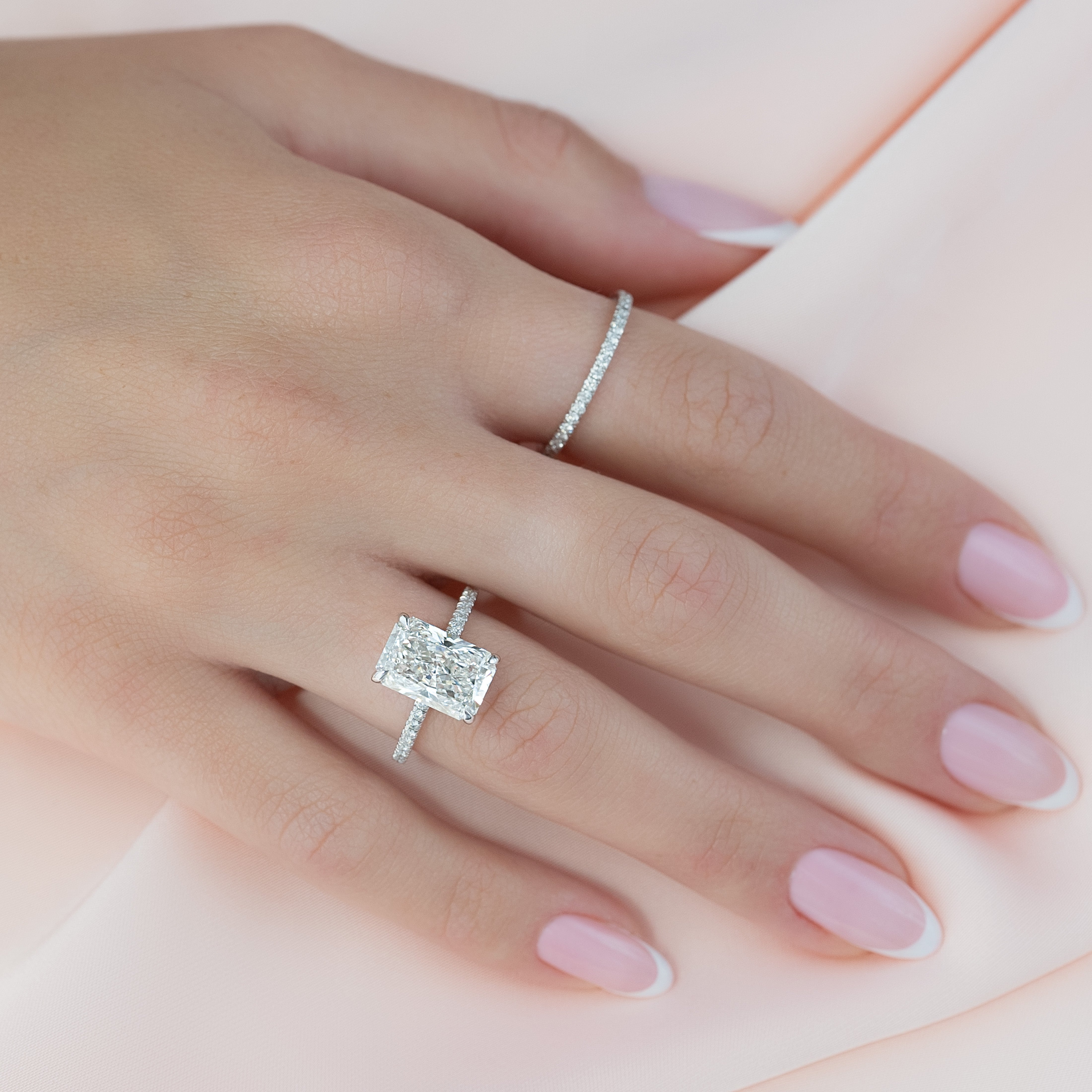 Radiant cut CVD diamond engagement ring with pave diamond band in platinum setting