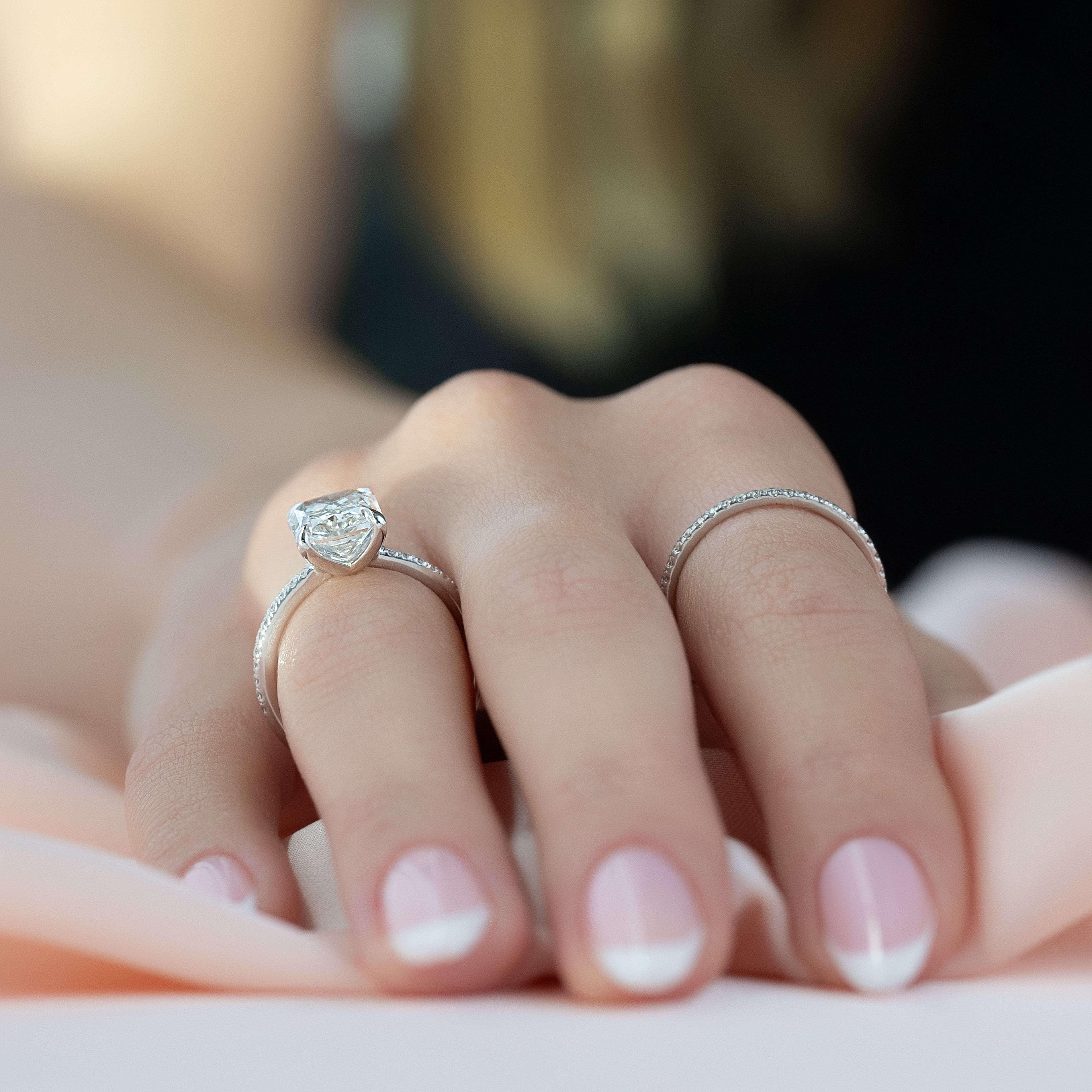 Radiant cut CVD diamond engagement ring with pave diamond band in platinum setting